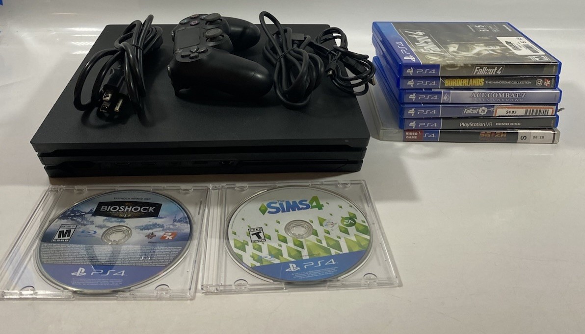 Sony PS4 Pro 1TB Console Bundle + Controller + 8 Games