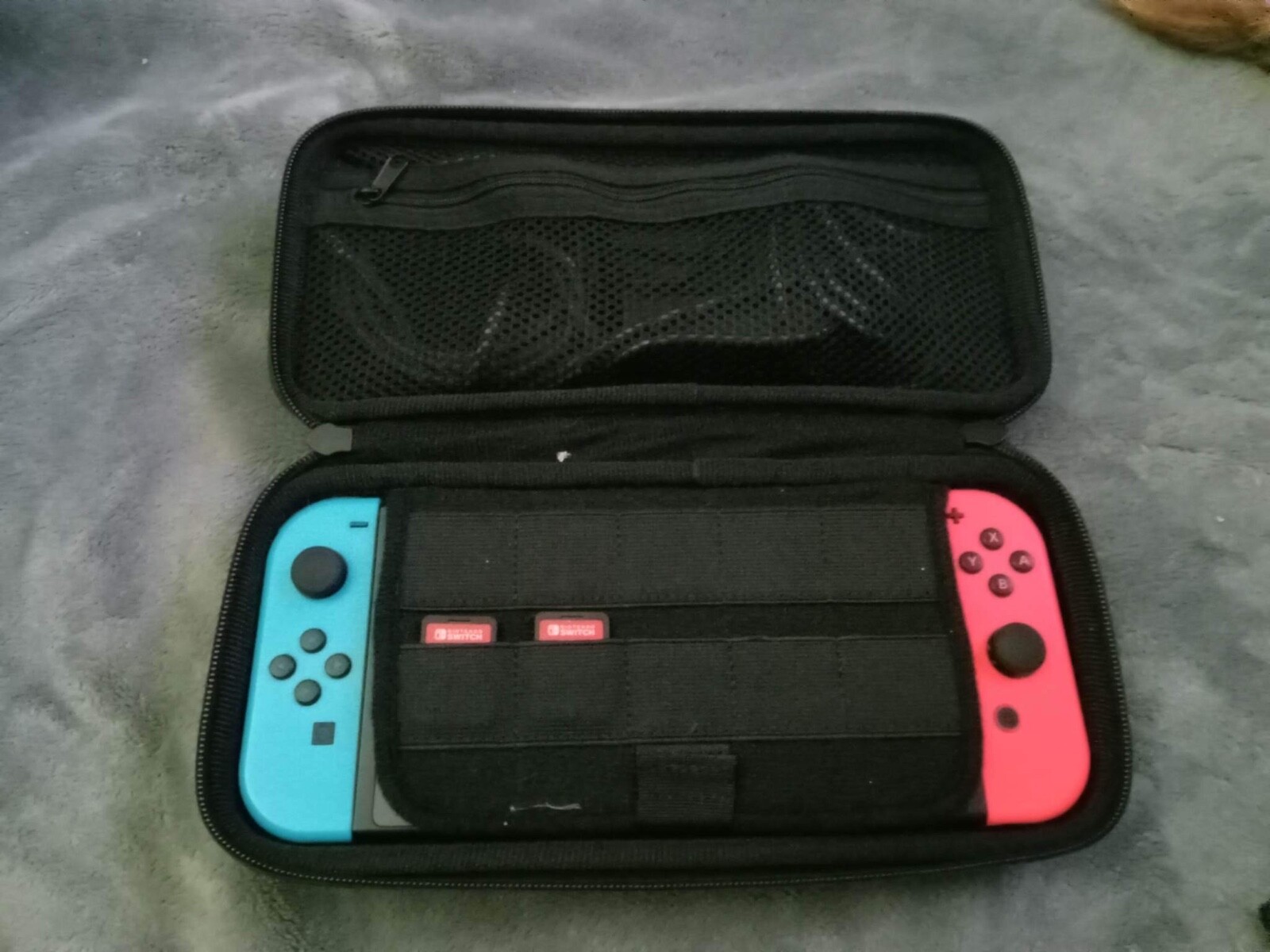 nintendo switch. Basically new. Comes with games,case,headphones,etc