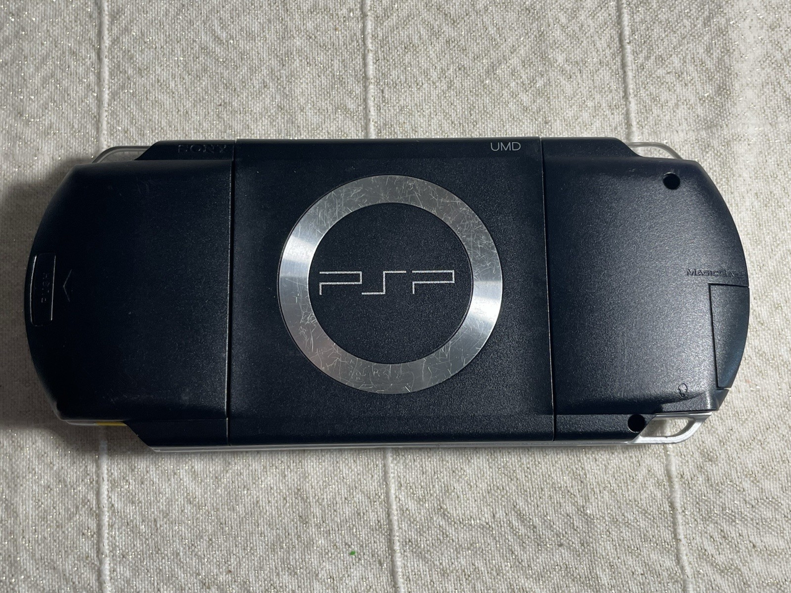 Sony PSP-1001 Black Console w/ 2GB Sony Storage Memory Card, 4 UMDs, Yes Charger