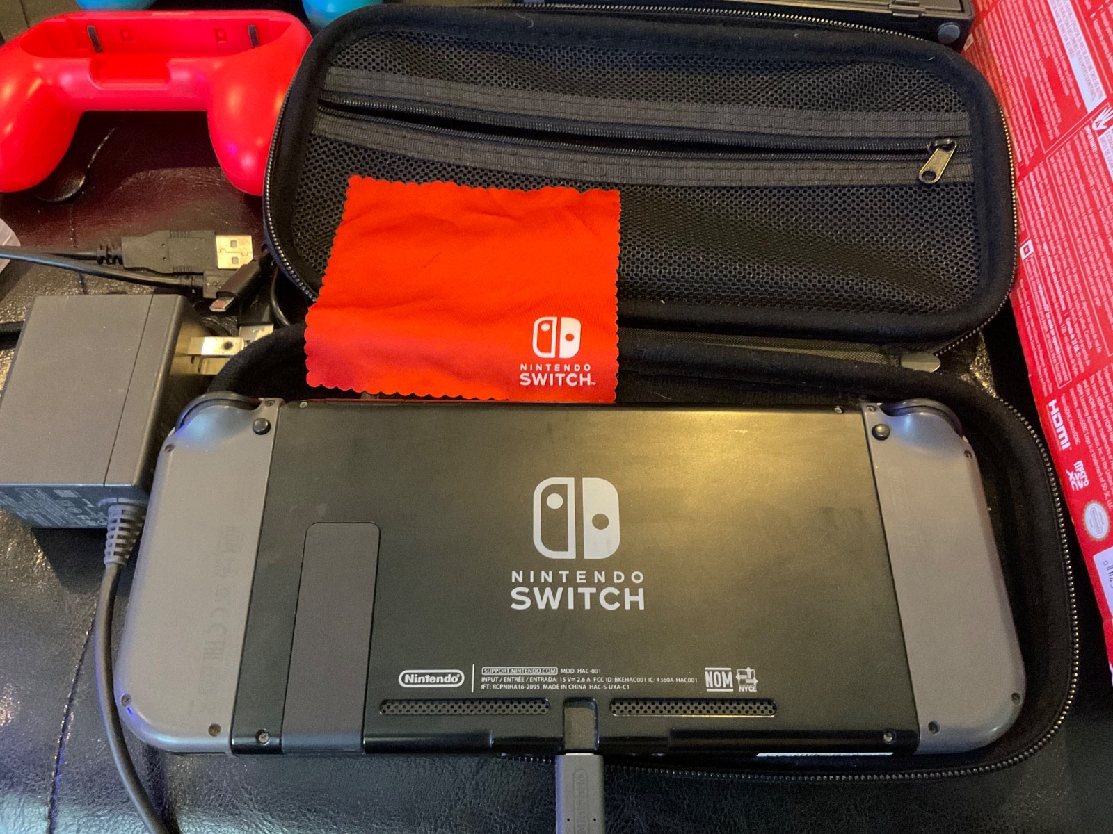 Nintendo Switch 32GB Gray Console with Neon Red and Neon Blue Joy-Con.