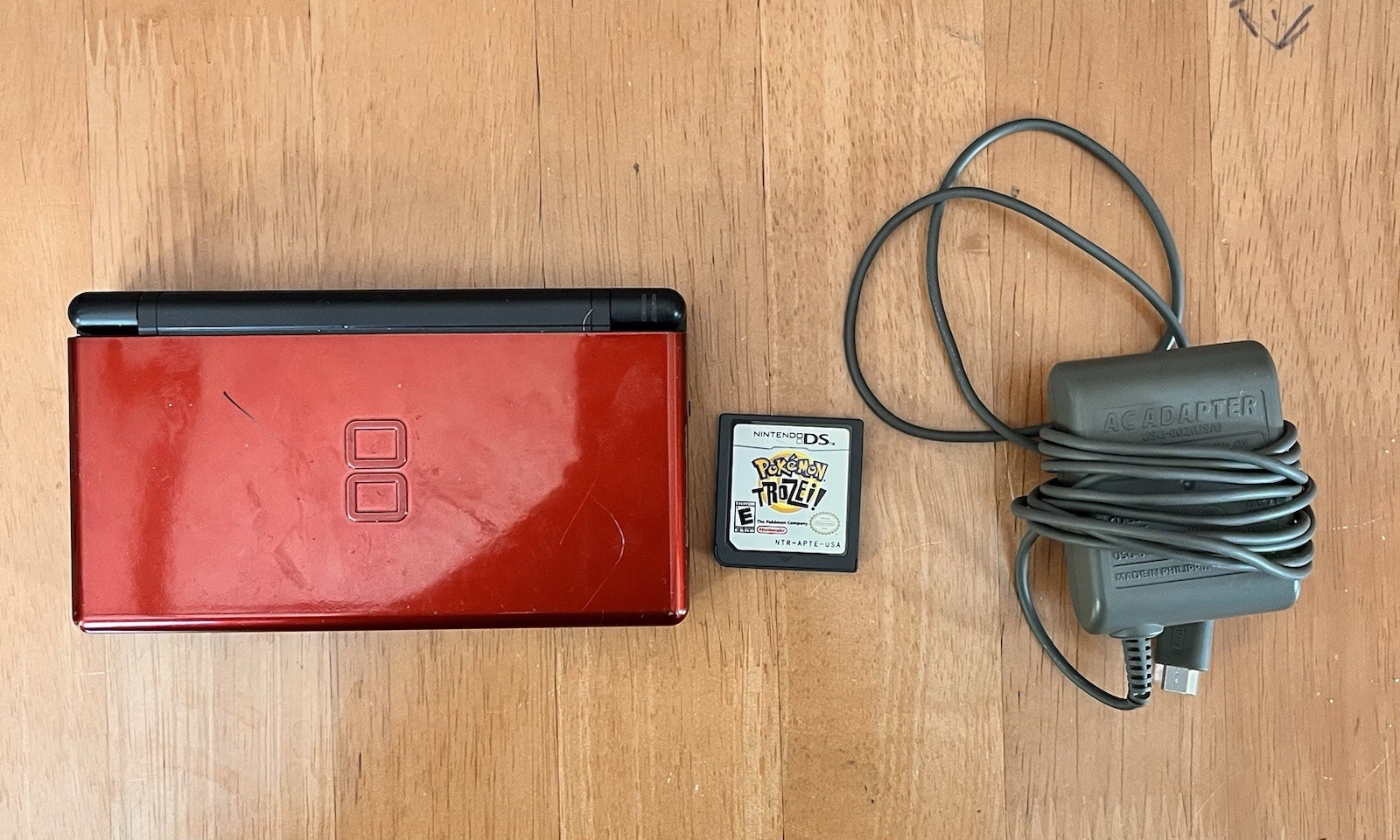 Nintendo DS Lite Crimson Handheld System – Red/Black Works Set With Game