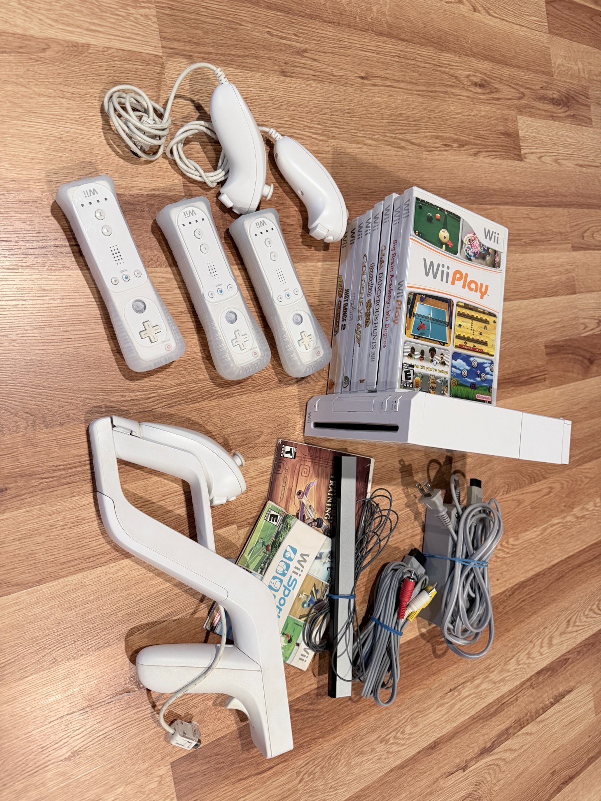 Nintendo Wii Bundle – Tested, Cleaned & Ready to Play | 3 Remotes | 10 Games