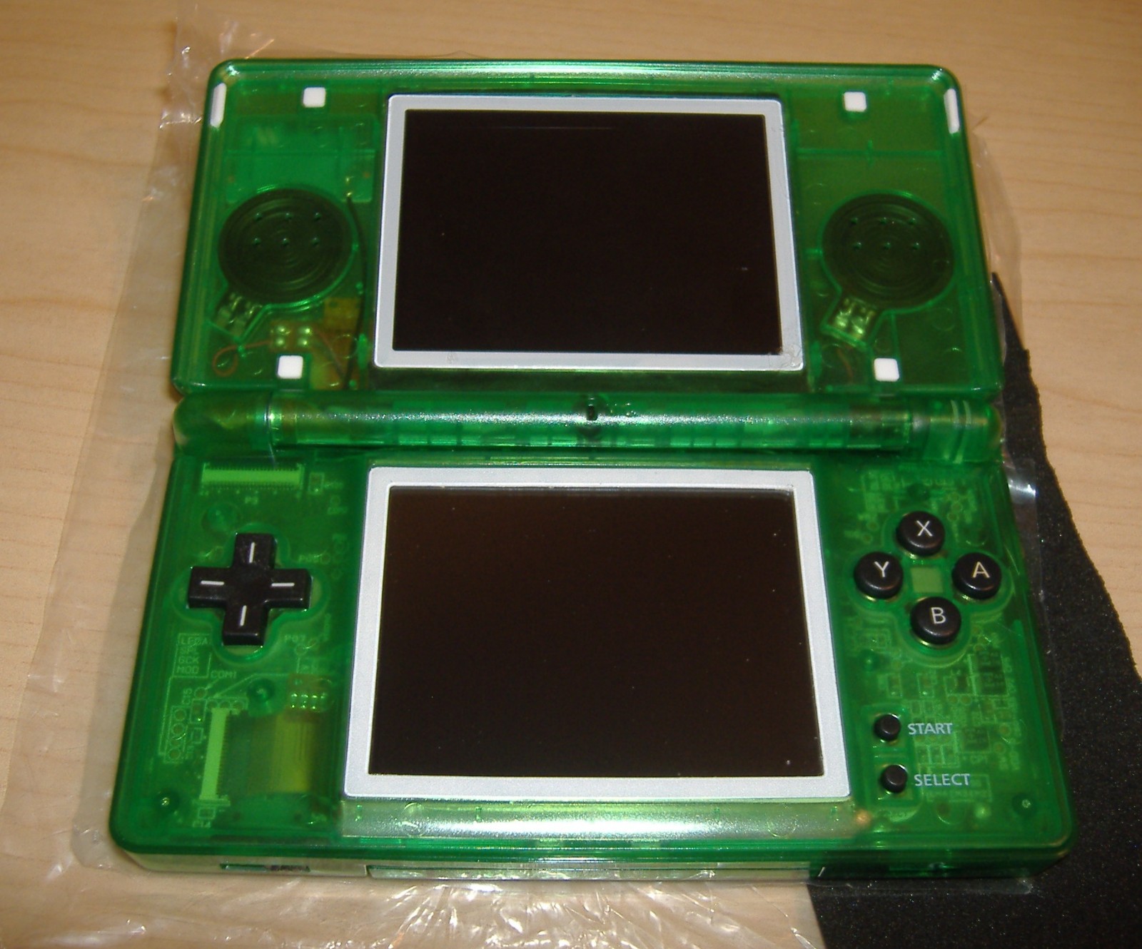 NINTENDO DS LITE TRANSPARENT GREEN NEW SHELL NEW DIGITIZER + USED OEM CHARGER