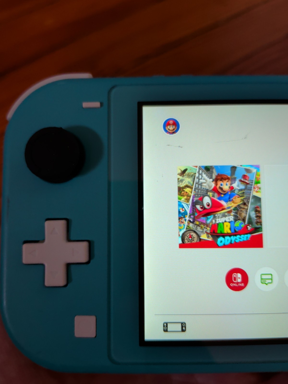 Nintendo Switch Lite Turquoise 32GB Console; Charger & Mario Odyssey Game – Fair