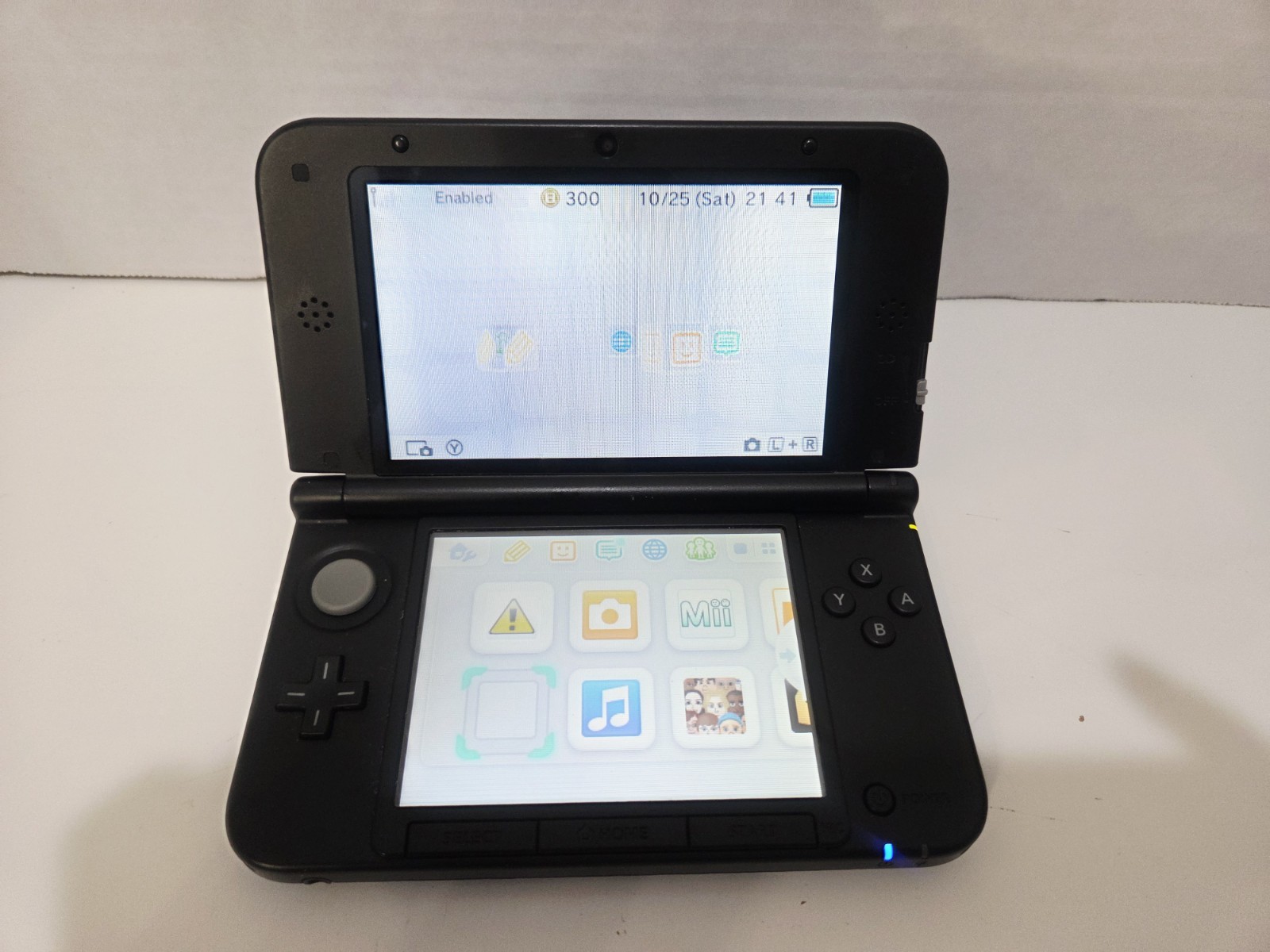 Nintendo 3DS XL Blue w/ Charger & 11 Games, Stylus & Guitar Hero Control Grip