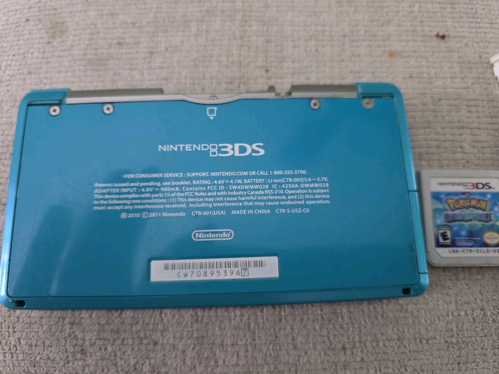 Nintendo 3DS 2GB Aqua Blue Handheld W/Charger, Stylus, & Pokemon Alpha Sapphire
