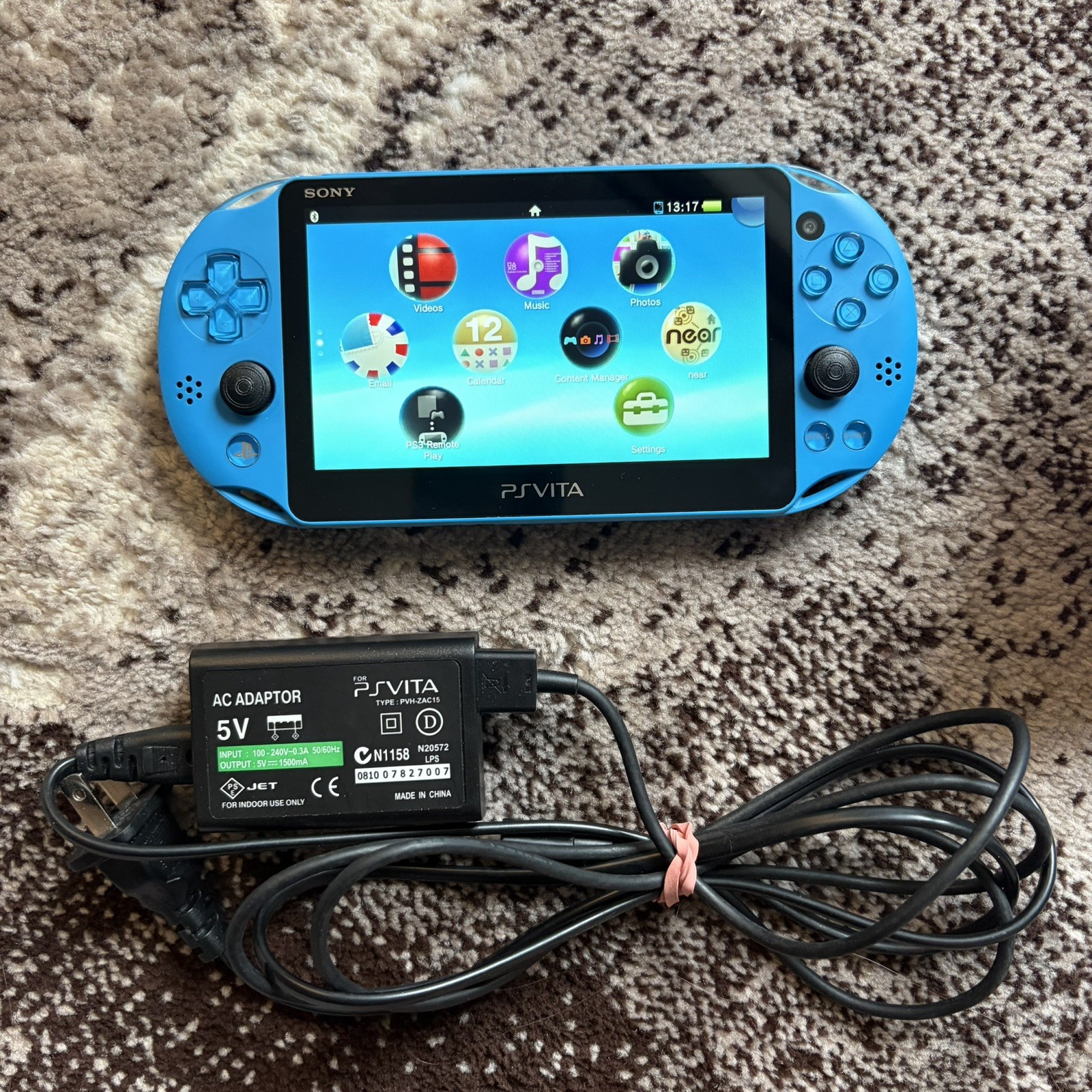 PS Vita Blue PCH-2000 ZA23 Slim Aqua Bundle, 2 Games + Charger 16GB Memory