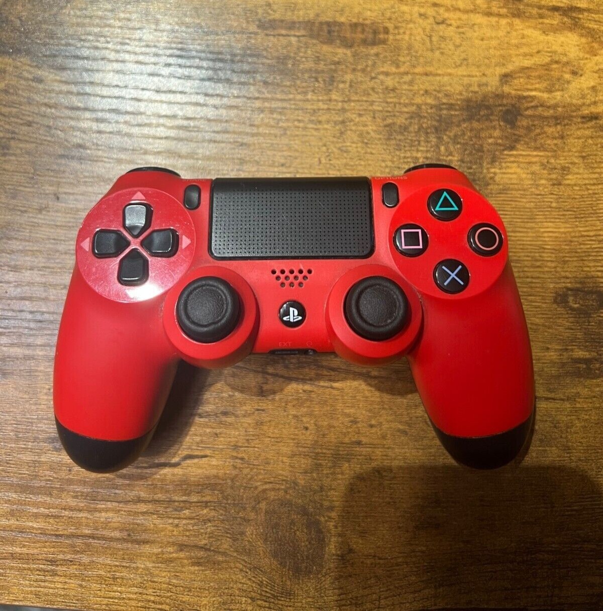 PlayStation 4 (Used) with 3 Controllers (red, white, and blue) and 9 PS4 Games