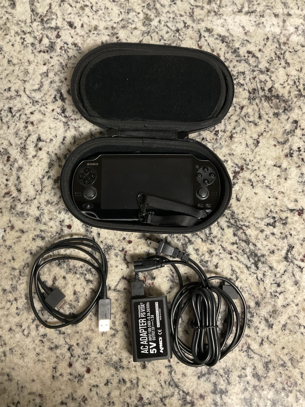 PS Vita PCH-1000 Sony Playstation Black Console with Charger Used and Tested