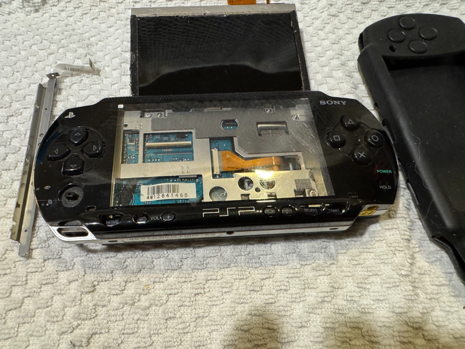 Sony PSP Go PSP-1001 PlayStation Portable – Black – Non-working | parts only