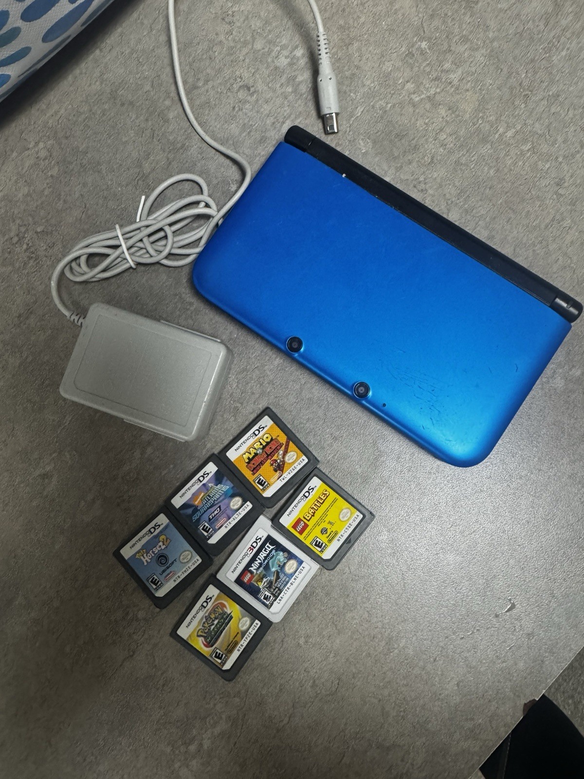 Nintendo 3DS XL Handheld System – Blue/Black With 7 Games