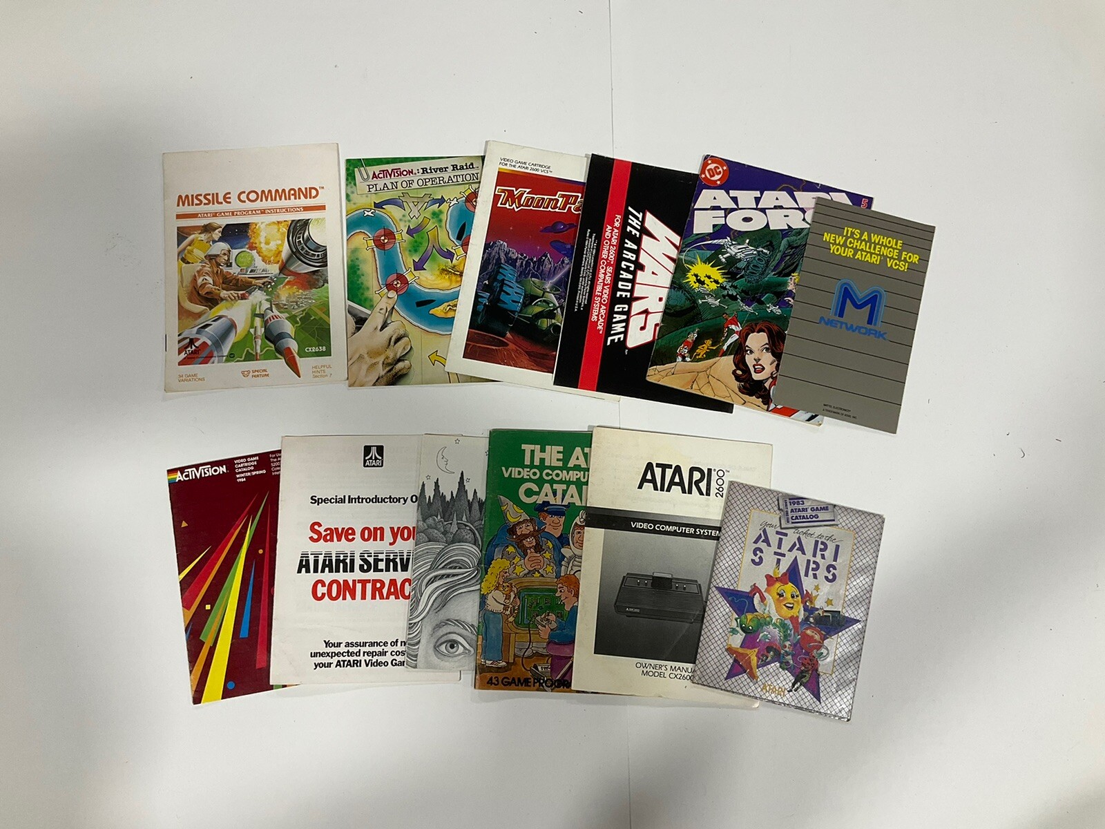 Atari 2600 With 32 Games 17 Of Them Have Manuals 3 Joysticks Video Game Holder