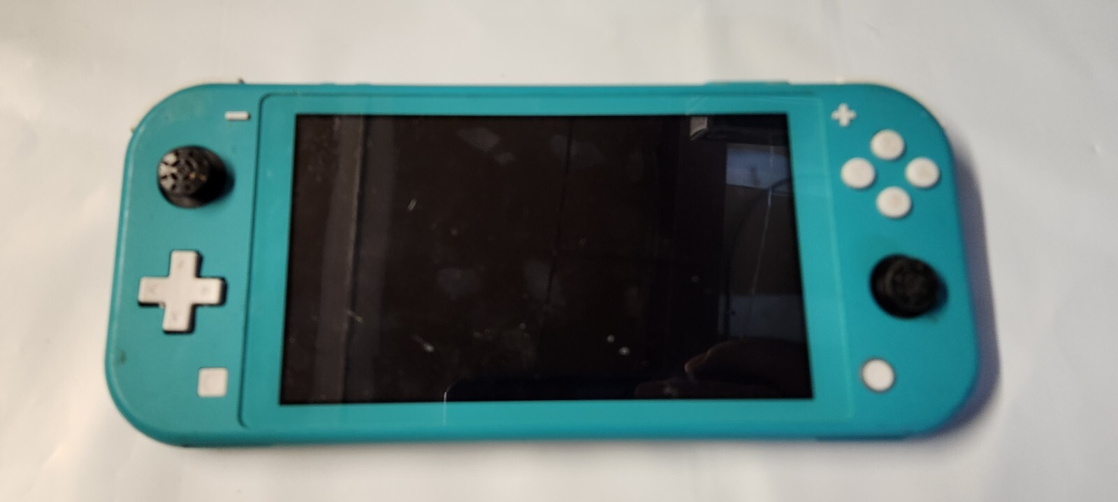 Nintendo Switch Lite 32GB Console – Turquoise SOLD AS IS FOR PARTS OR REPAIR