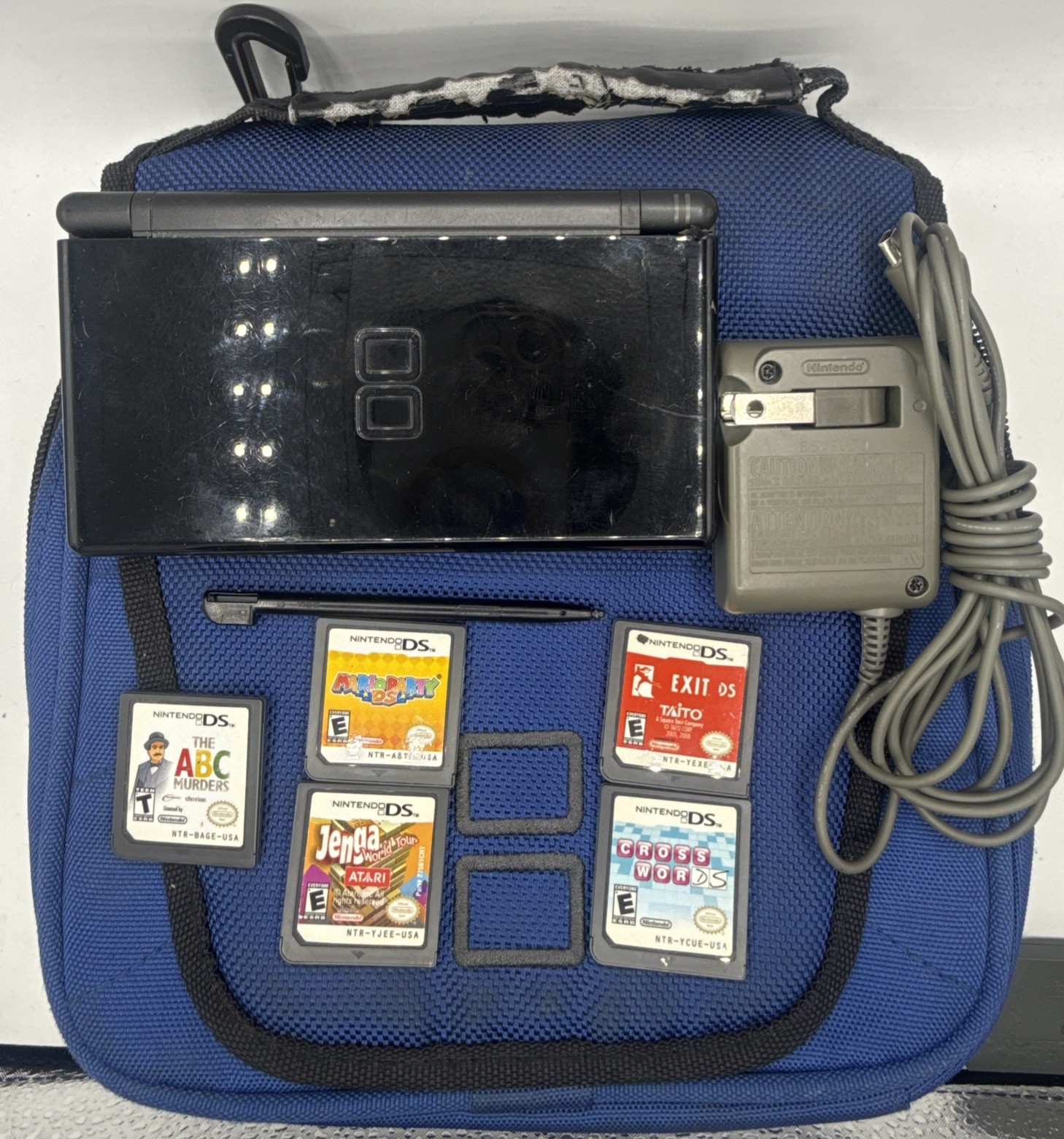 Nintendo DS Lite Handheld Black USG-001 Bundle 5 Games, Case, Charger, & Stylus