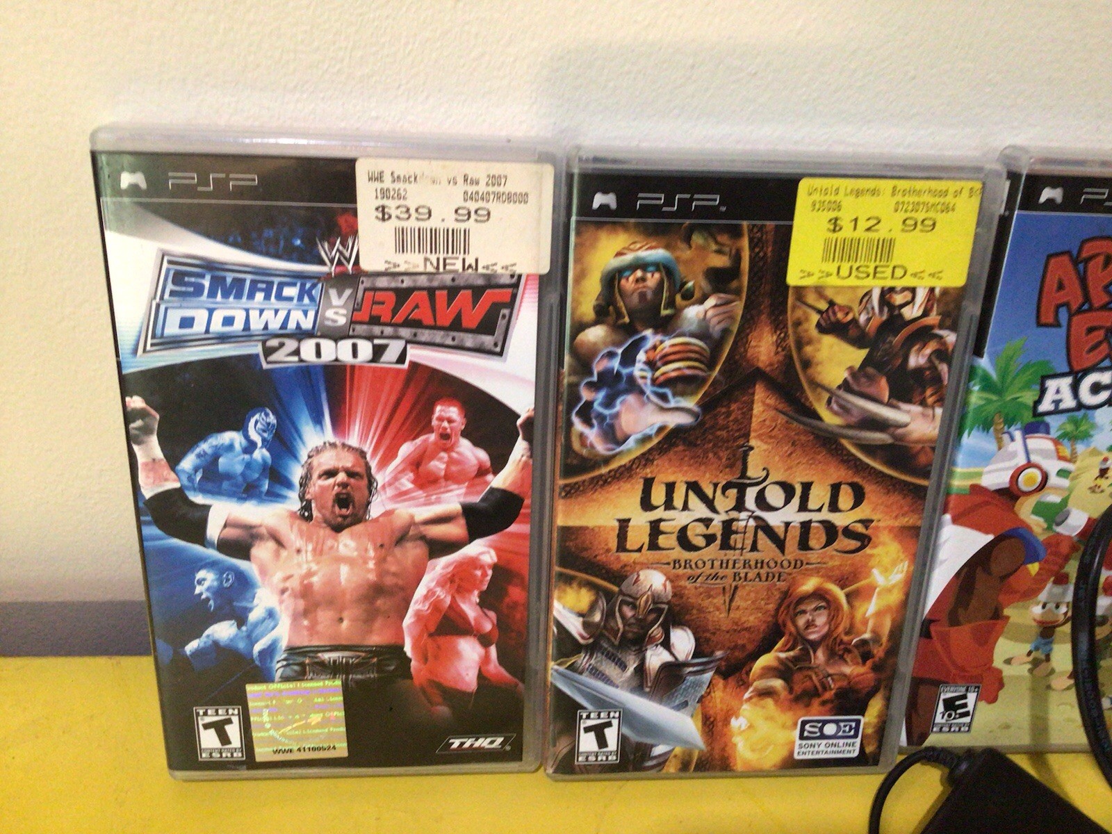 PSP 1001 Sony handheld console with 5 games and charger