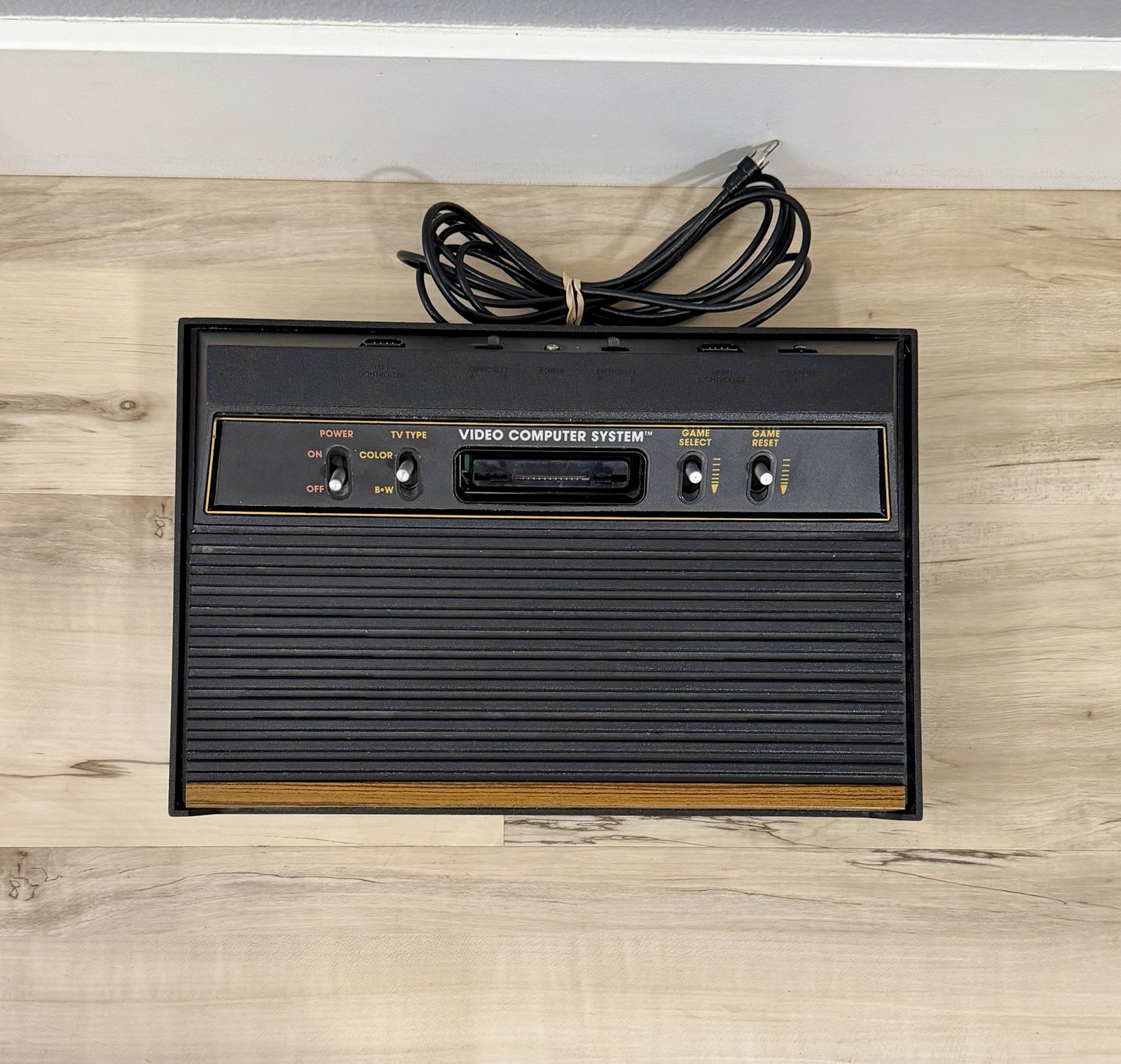 Atari 2600 4-Switch Woodgrain Console W/ 7-Games + Joystick – Tested