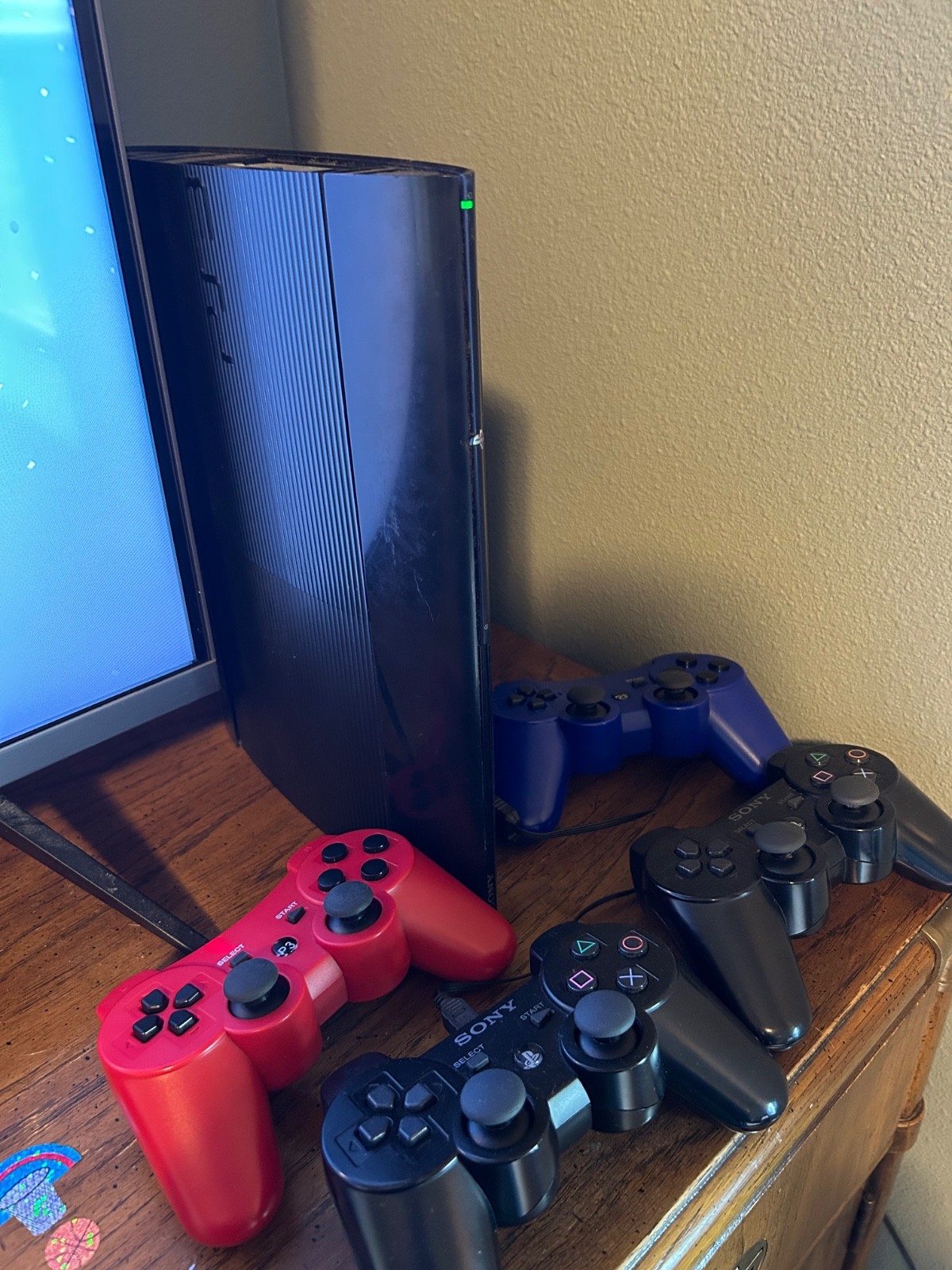 PS3 Super Slim 250GB, 4 Wireless Controllers, all cables, many Excellent games!