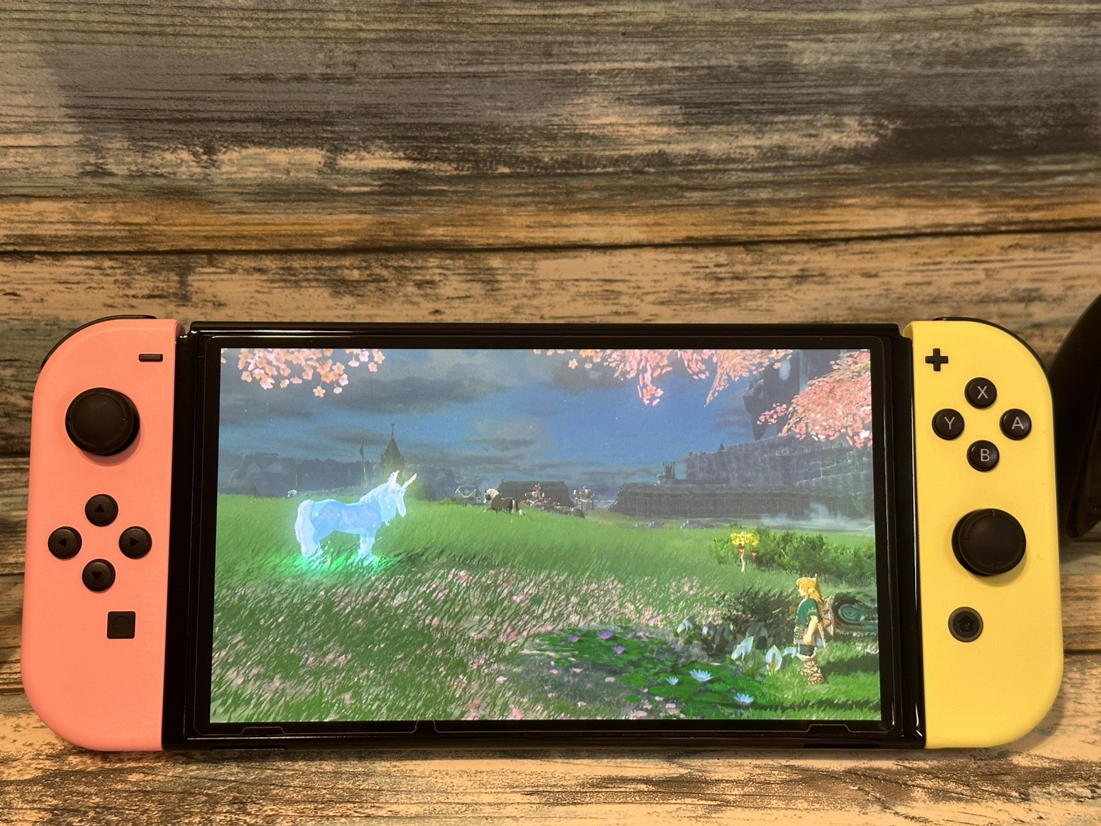 Nintendo Switch OLED Model w/ Neon Red & Neon Blue JoyCon Console + 2 JoyCons