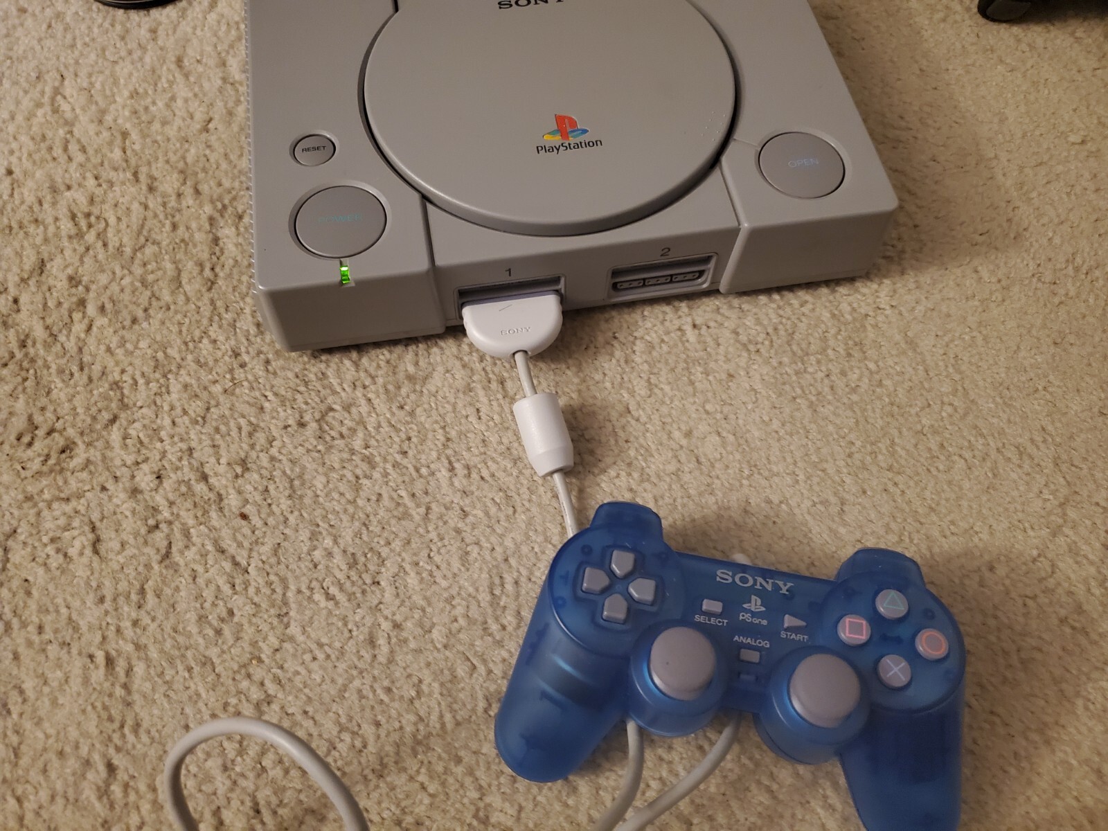 Sony Playstation 1 Gray Console With Blue Sony Controller, A/V Cable, and Power