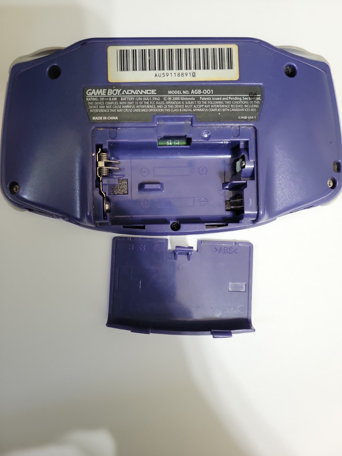 Nintendo Game Boy Advance Handheld System – Indigo (Works, Broken Battery Cover)