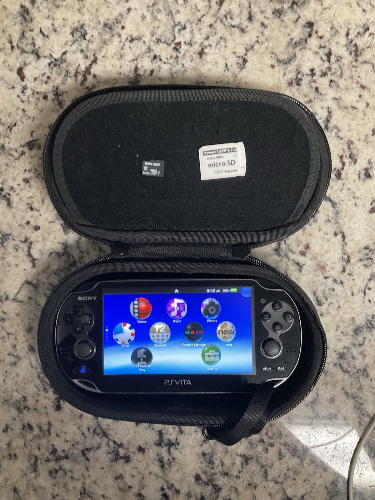 PS Vita PCH-1000 Sony Playstation Black Console with Charger Used and Tested