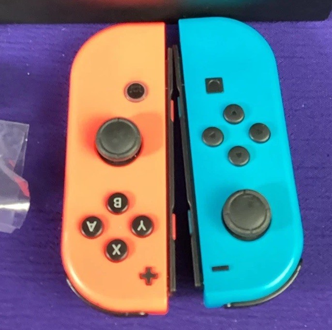 Nintendo Switch OLED Model HEG-001 Handheld Console – 64GB – Black/Neon Joy-cons