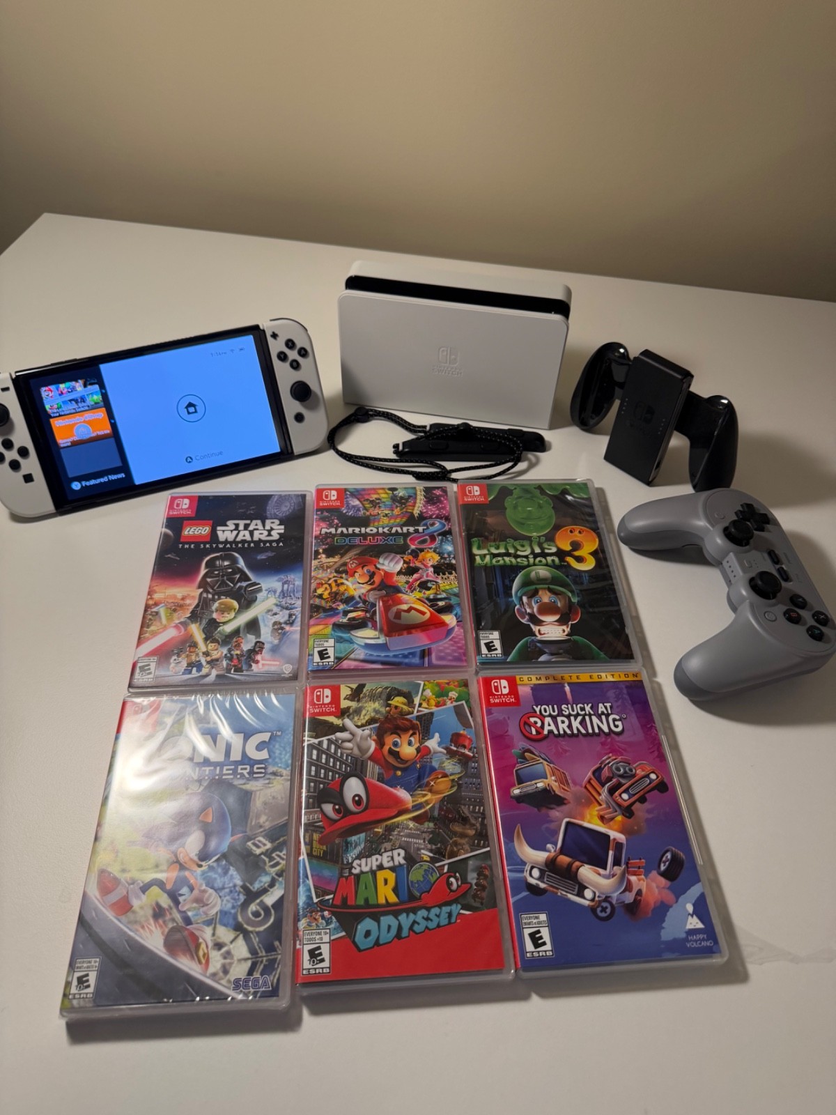 Nintendo Switch OLED Console + 6 Games + Extra Controllers (Some Games Unopened)