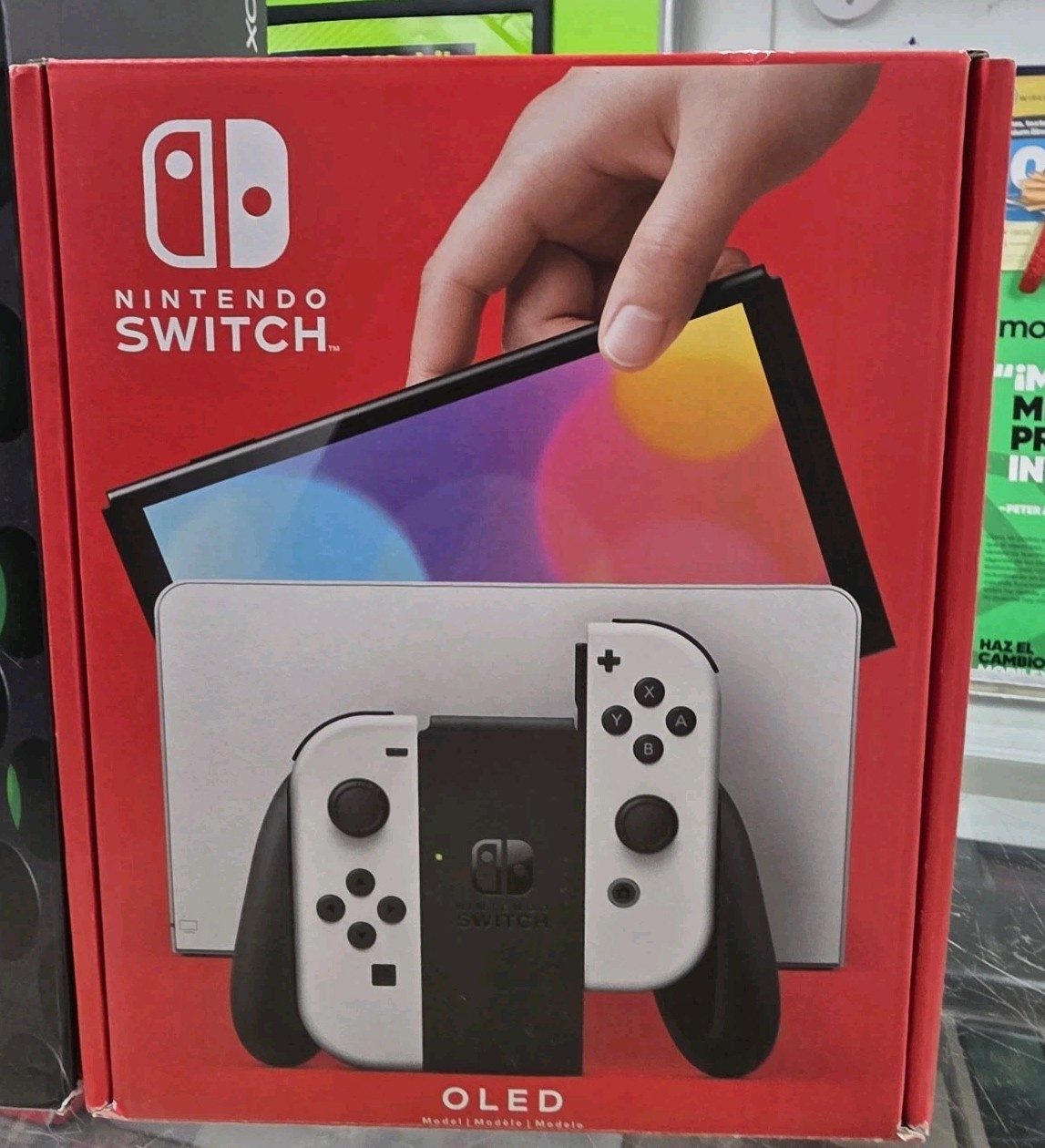 Nintendo Switch – OLED Model w/ Neon Red & Neon Blue 64 GB 7″ screen LAN port