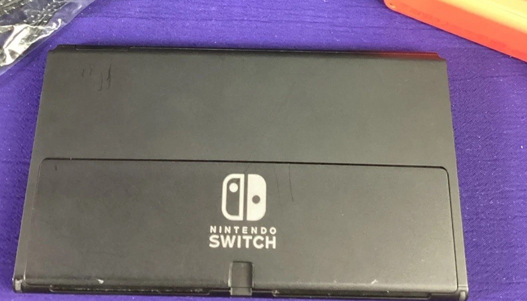 Nintendo Switch OLED Model HEG-001 Handheld Console – 64GB – Black/Neon Joy-cons