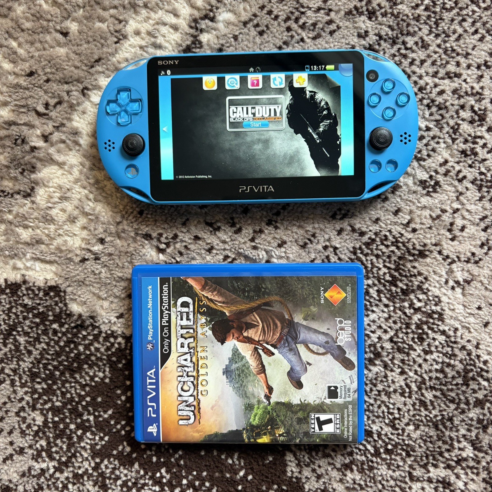 PS Vita Blue PCH-2000 ZA23 Slim Aqua Bundle, 2 Games + Charger 16GB Memory