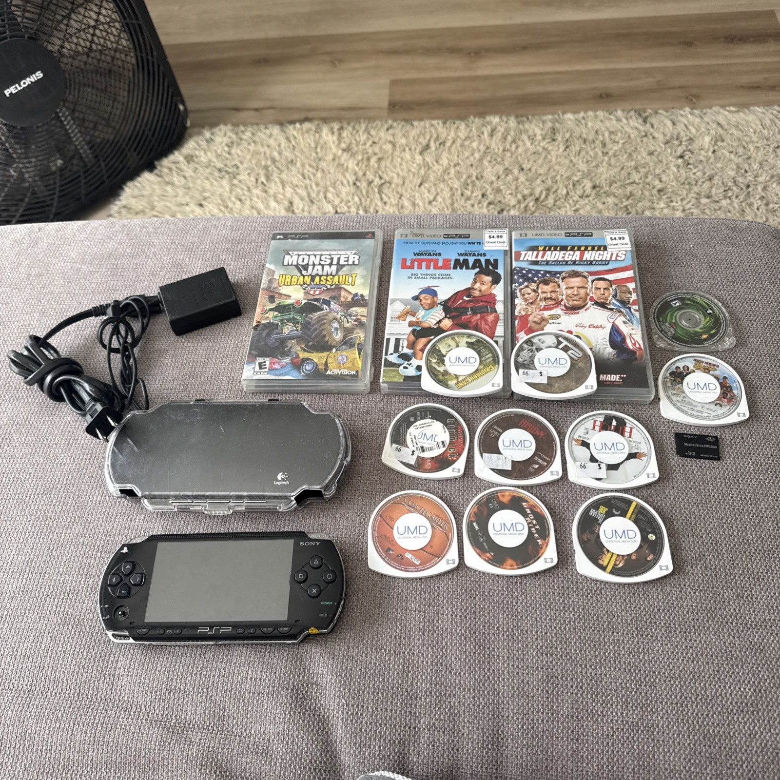 Sony PSP-1001 Black Console With Charger, 1GB Card , 11 Movies 2 Games & Case