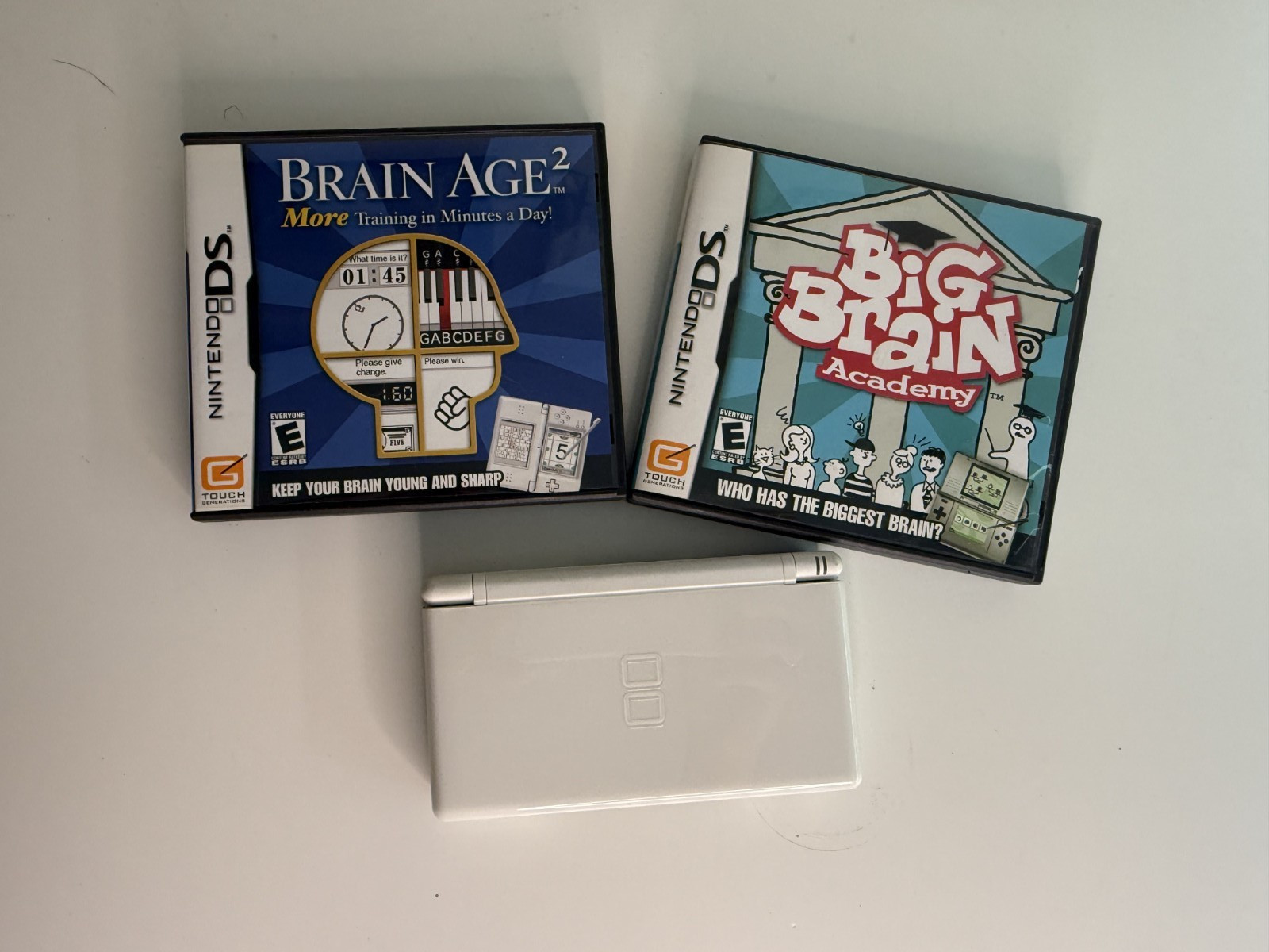 Nintendo DS Lite Handheld Console – Polar White Comes with two Games