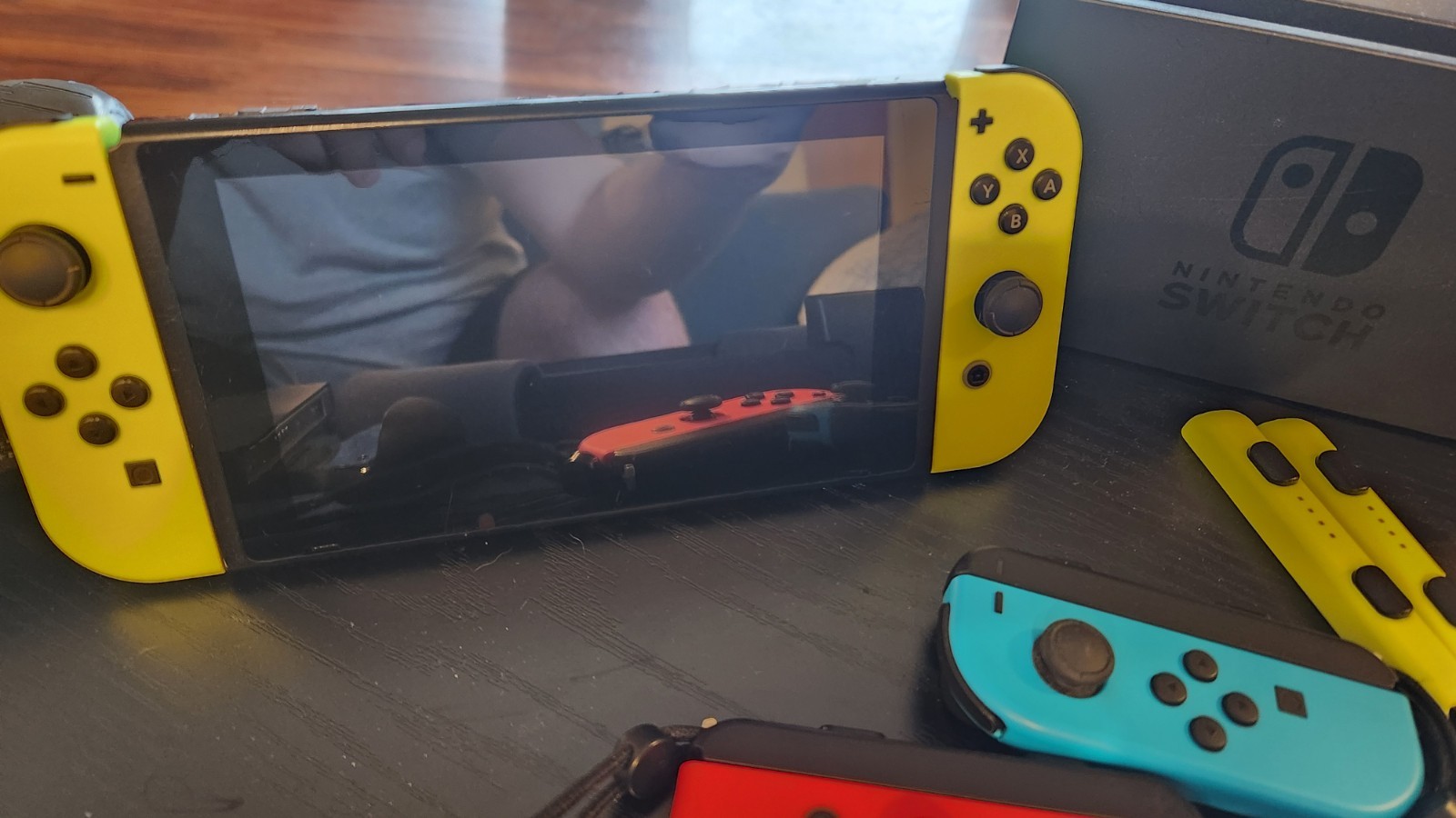 Nintendo Switch 32GB Gray Console with Neon Red and Neon Blue Joy-Con
