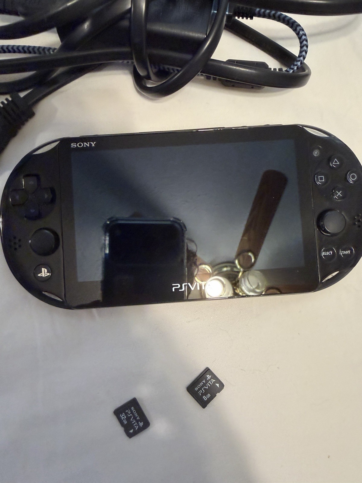 Sony PlayStation Vita Black + 32GB STORAGE Memory Card (and 8GB Extra) + Charger
