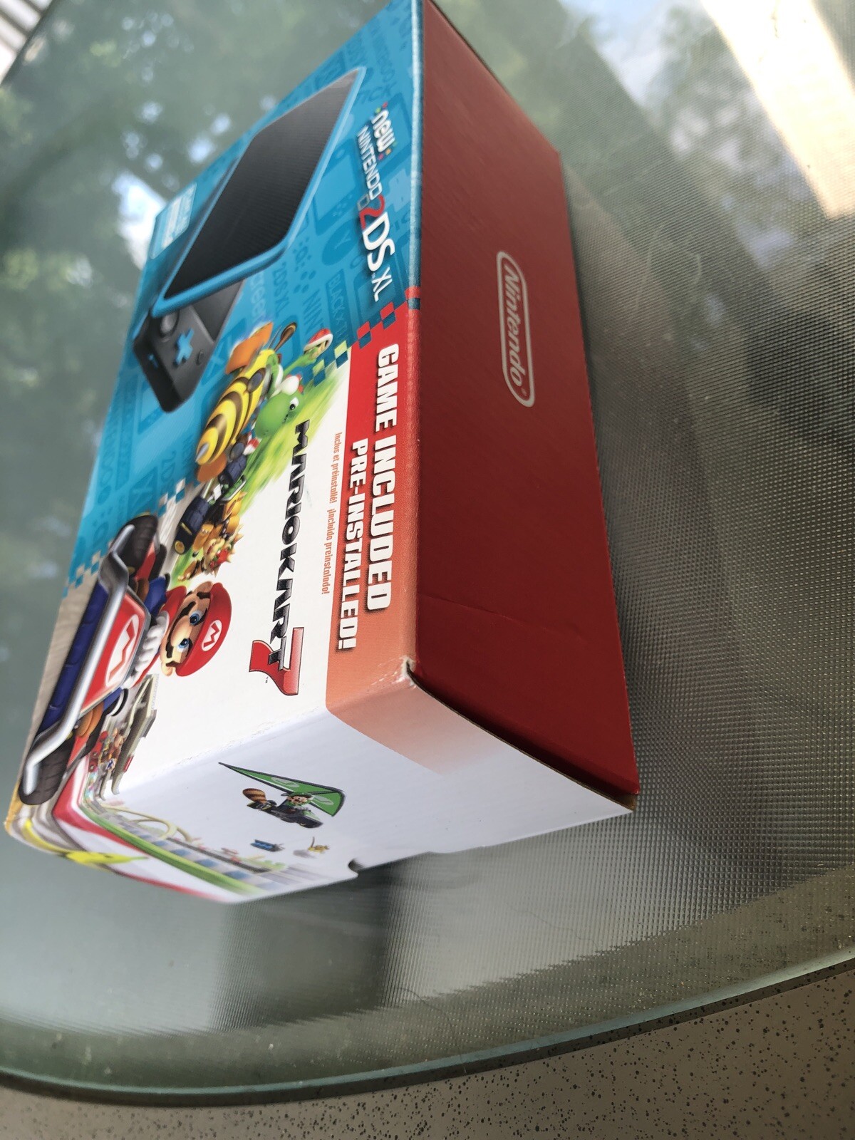 New Nintendo 2DS XL – Black + Turquoise With Mario Kart 7 Pre-installed New