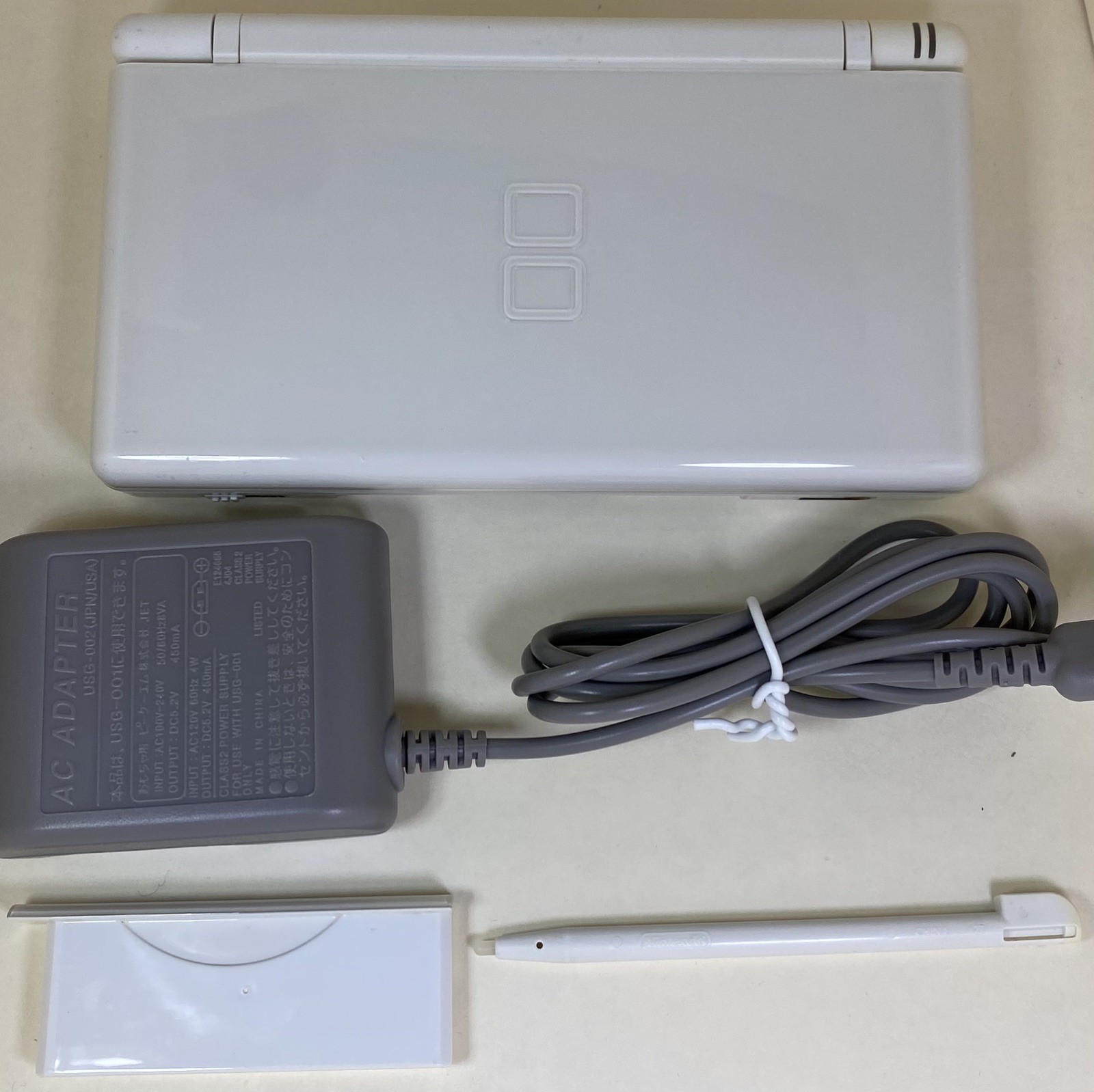 Nintendo DS Lite Polar White w/ Charger, Stylus, and Slot-2 Dust Cover