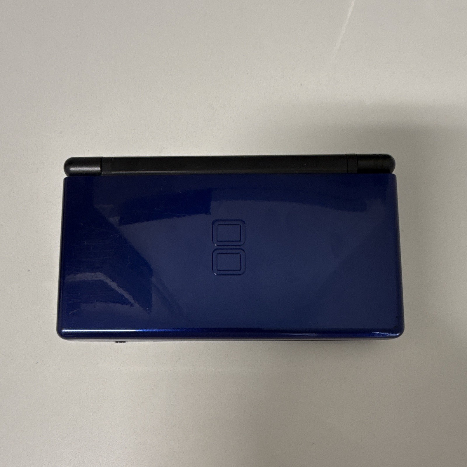 Nintendo DS Lite Navy Blue Console Bundle w/ GBA Case, Charger & 2 Mario Games