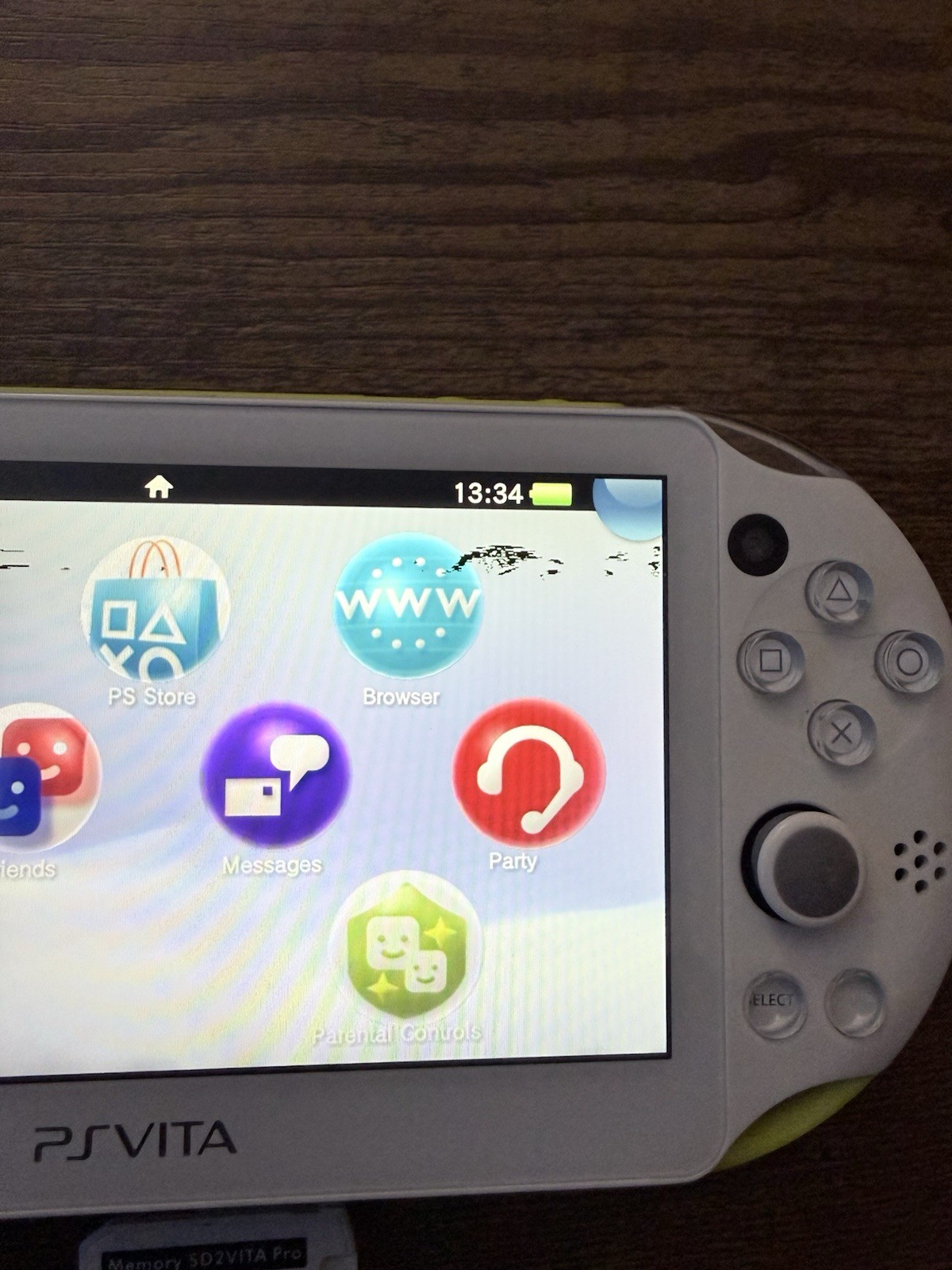 Sony PS Vita 2000 Handheld Console White/Yellow with Wi-Fi micro SD Adapter