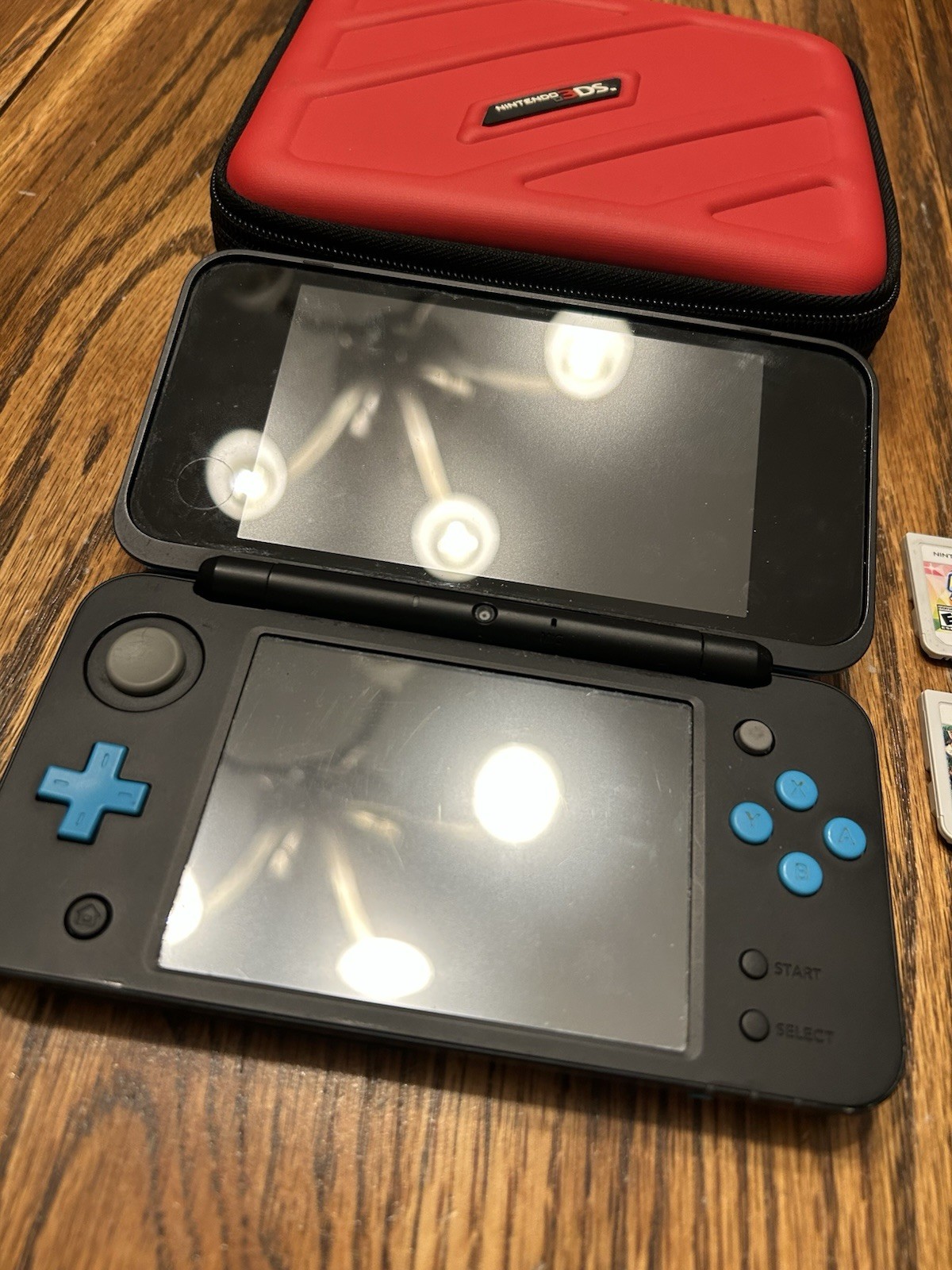 Nintendo 2DS XL Handheld Console w Mario Kart 7 Black/Turquoise Kirby Smash Case