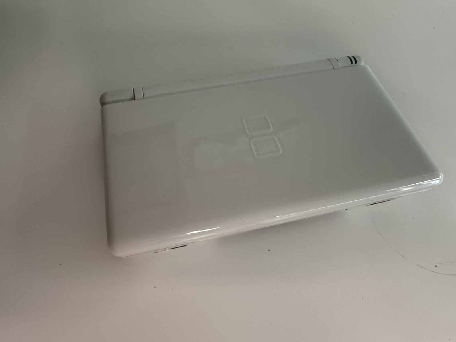 Nintendo DS Lite Handheld Console – Polar White Comes with two Games