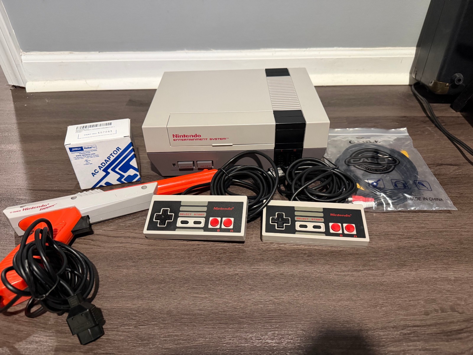 Original Nintendo NES Console, Recapped with Controllers and Zapper