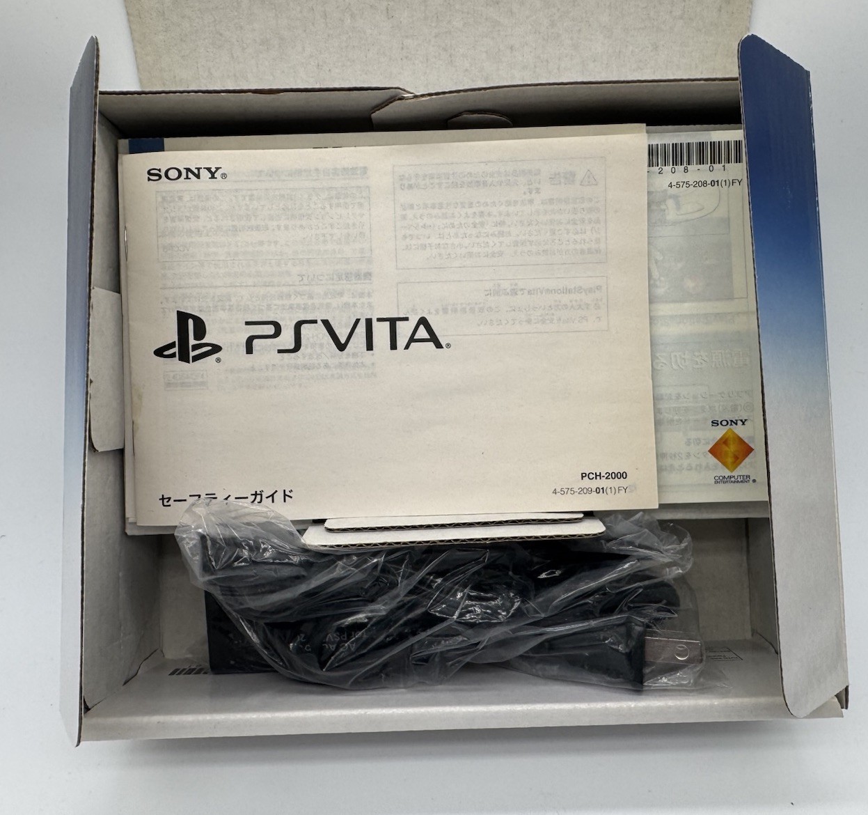 Playstation Vita 2000-Black- 16gb-w/ Charger-In Box-Import-In English
