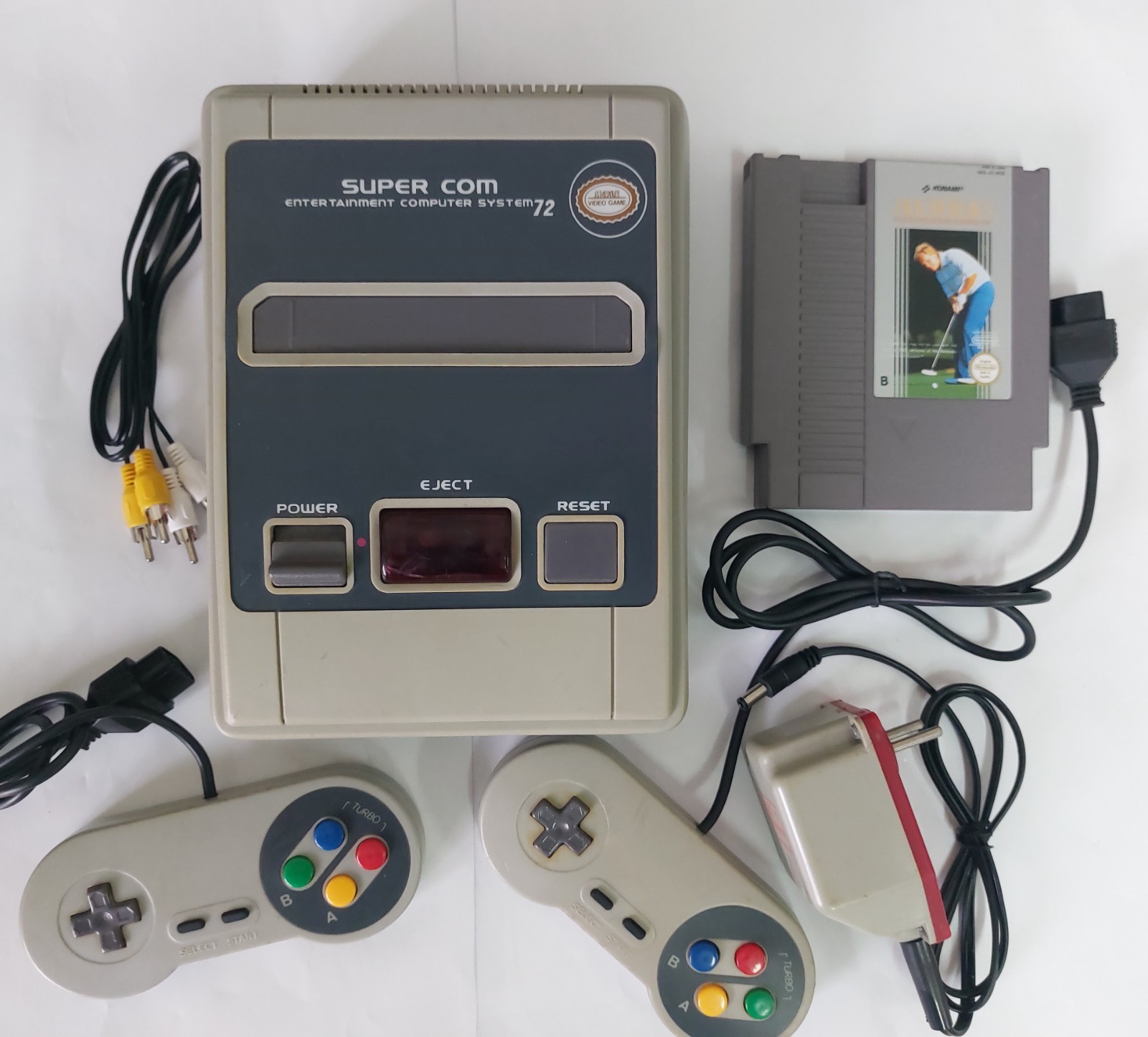 Super com 72 pin video game console from 90’s with Nintendo nes cartridge