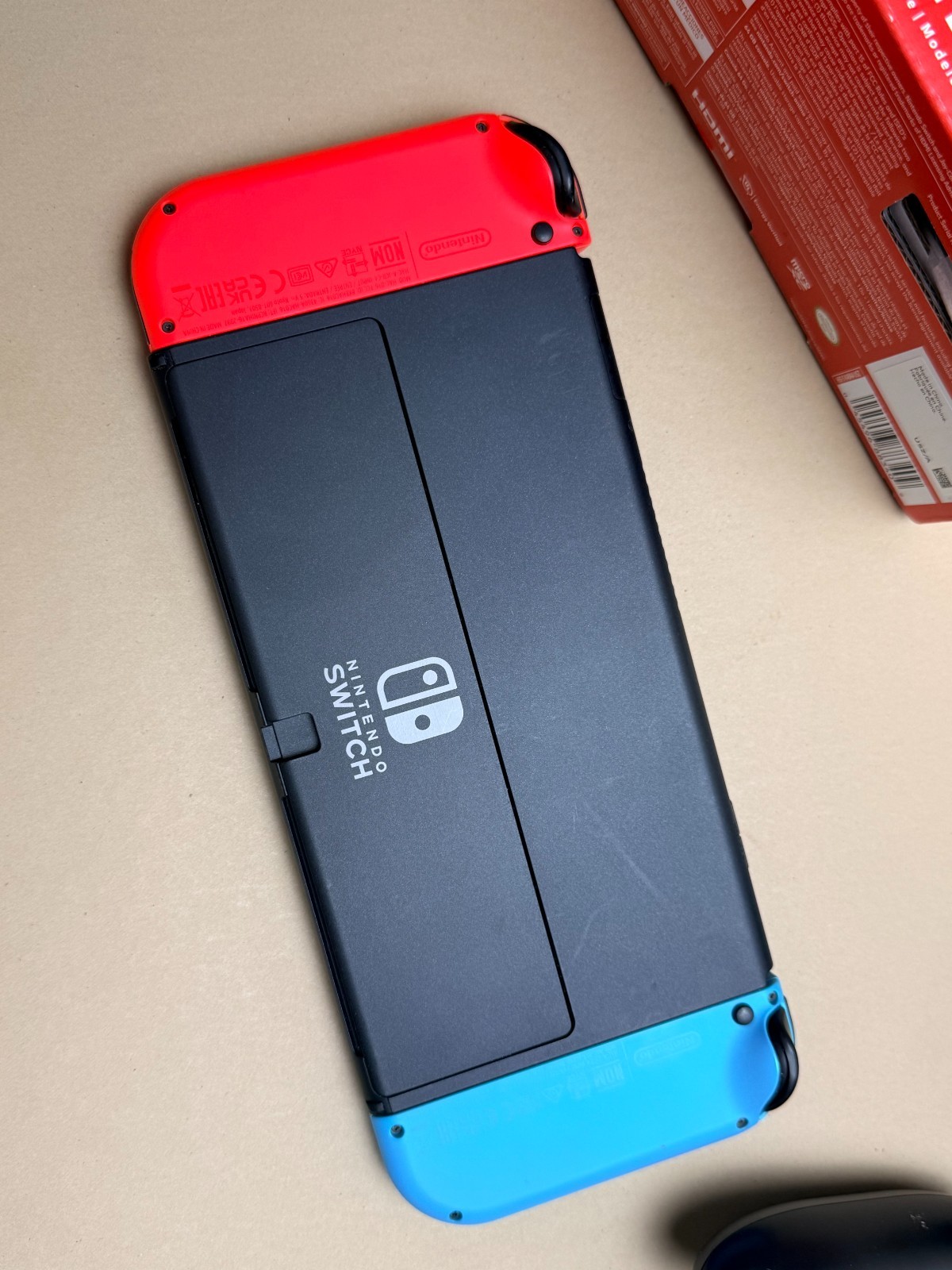 Nintendo Switch OLED Model HEG-001 Handheld Console – 64GB – Black/Neon Red/Neon