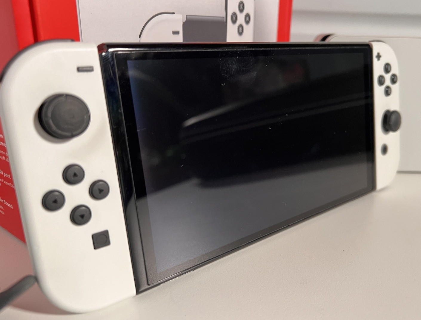 Nintendo Switch OLED Model HEG-001 Handheld Console – 64GB – White.