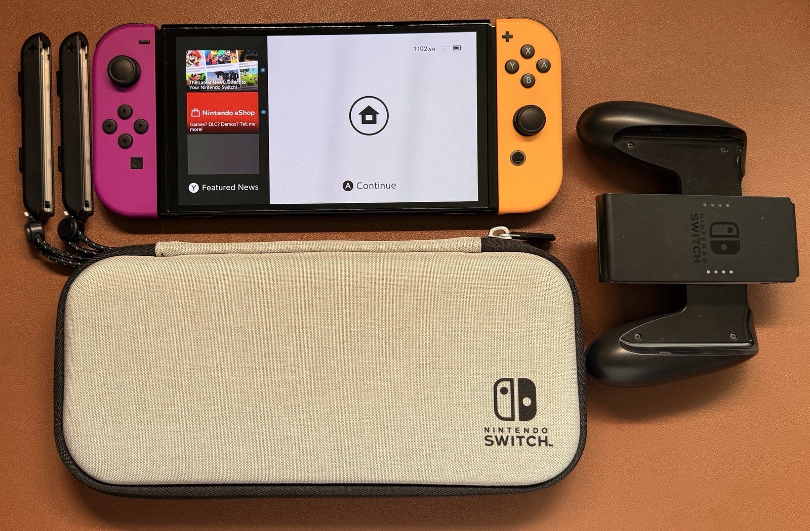 Nintendo Switch OLED Bundle Neon Purple Orange Joy-Con 512GB SD + Grip and Case