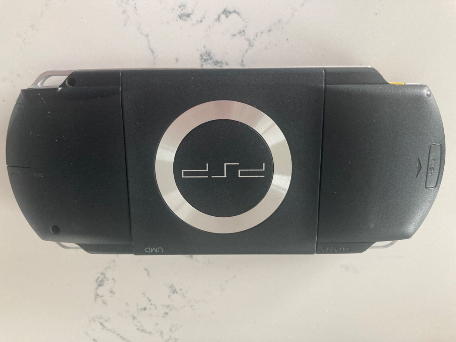 PSP complete with 10 games carrying case and power cord