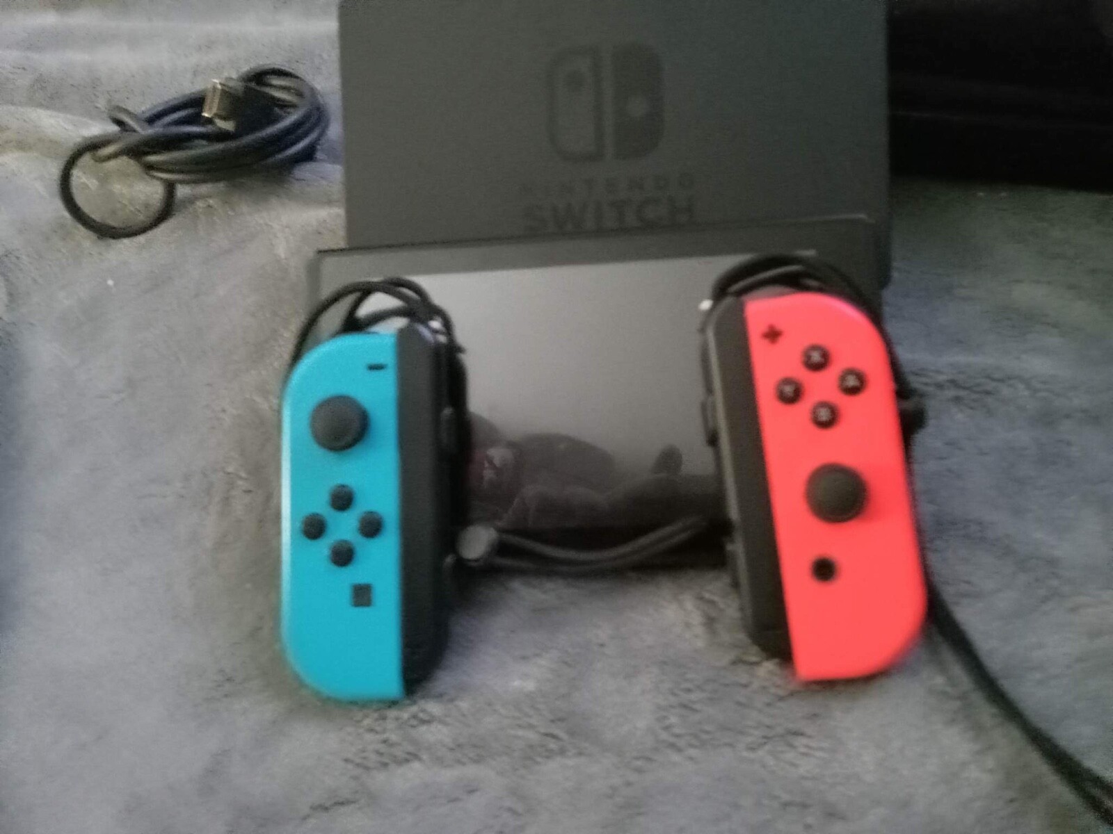nintendo switch. Basically new. Comes with games,case,headphones,etc