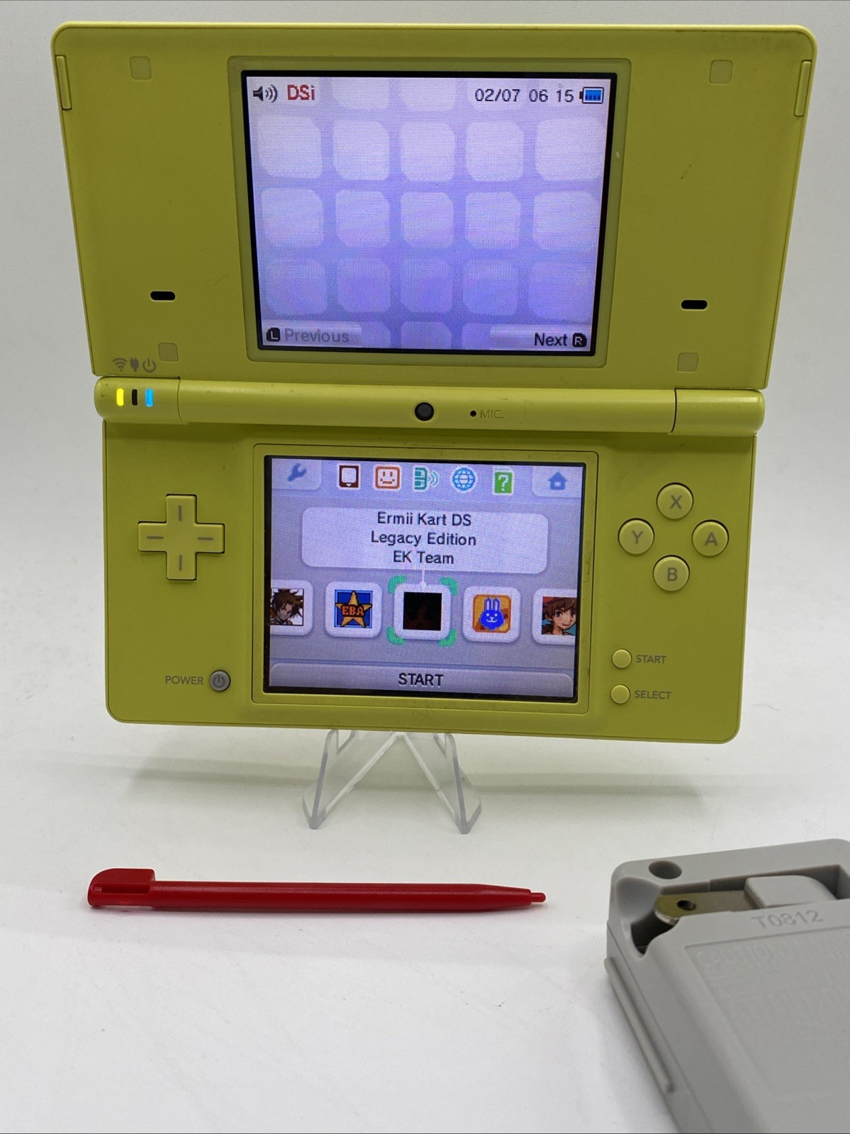 Nintendo DSi Yellow – Includes Preloaded Library (Large Collection)