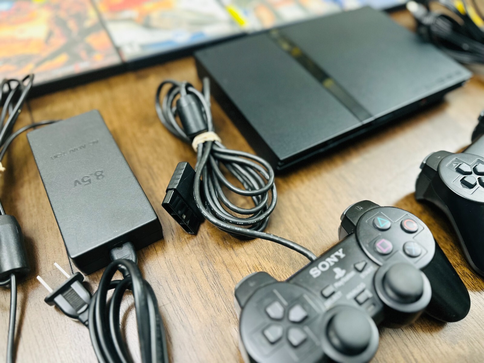 Sony Playstation 2 PS2 Slim Console, 2 controllers, games ac and av adap TESTED!